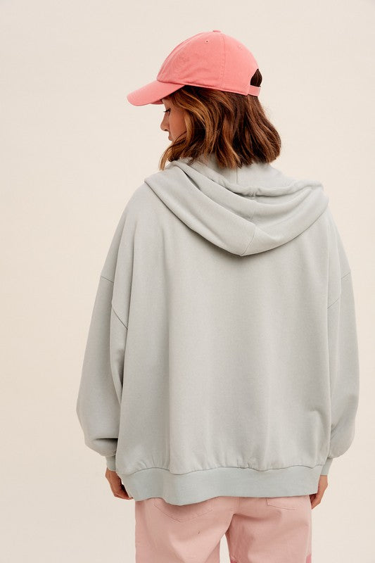 Taking Off Jacket in Sage