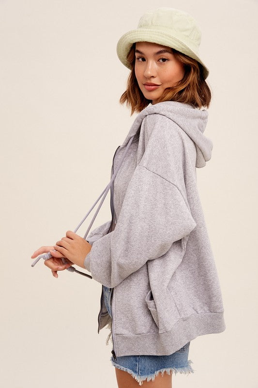 Taking Off Jacket in Heather Grey