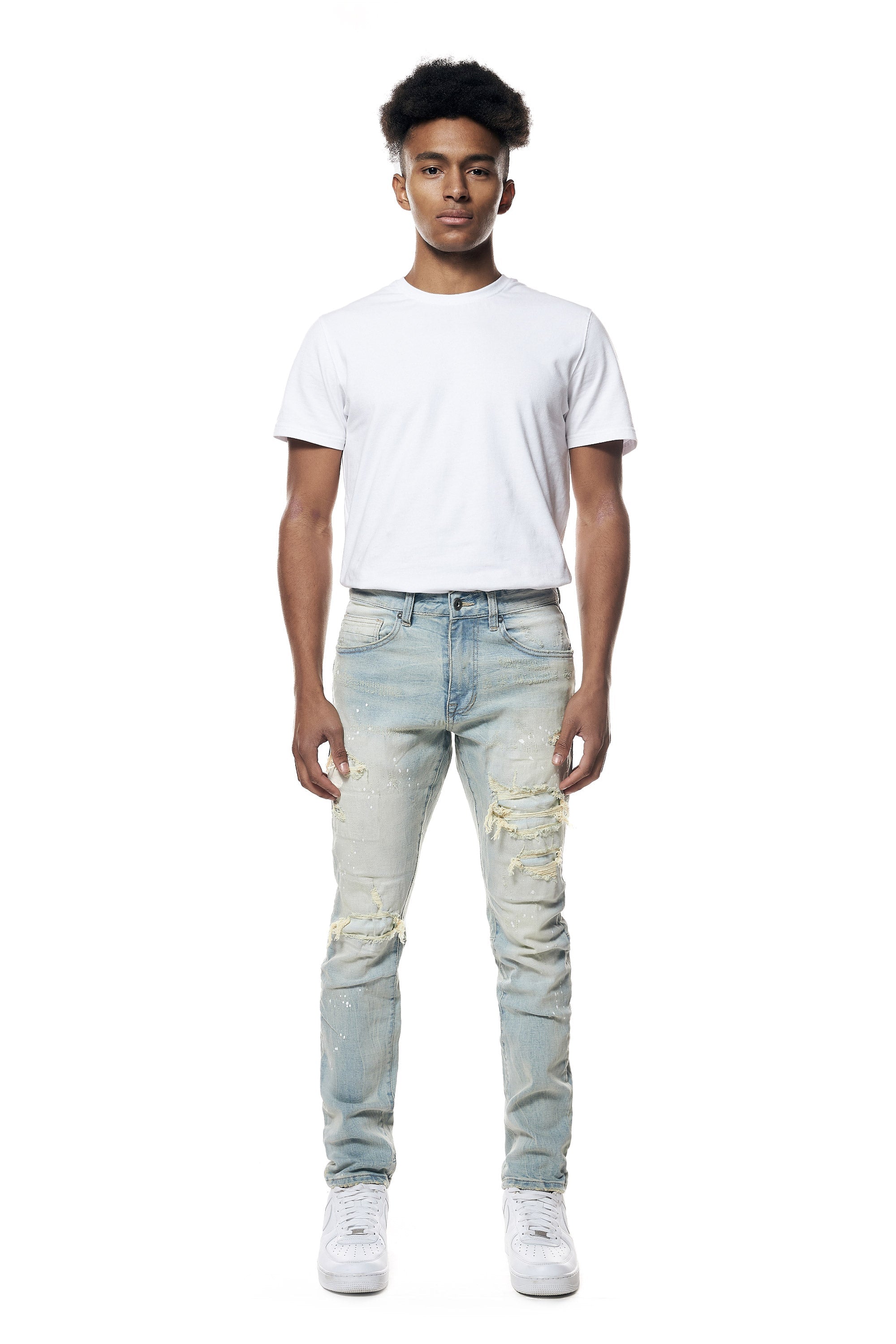 Distressed Rip & Repair Slim Tapered Denim Jeans