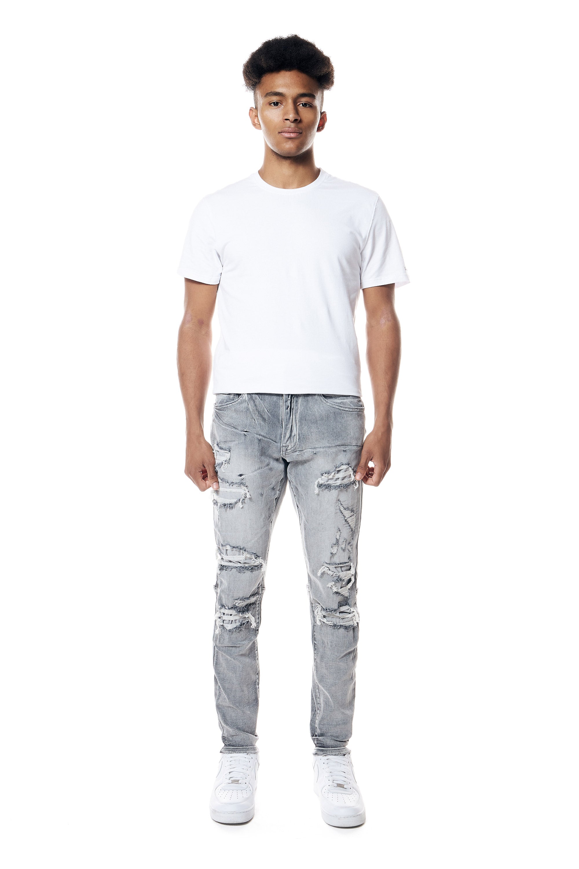 Distressed Rip & Repair Slim Tapered Denim Jeans
