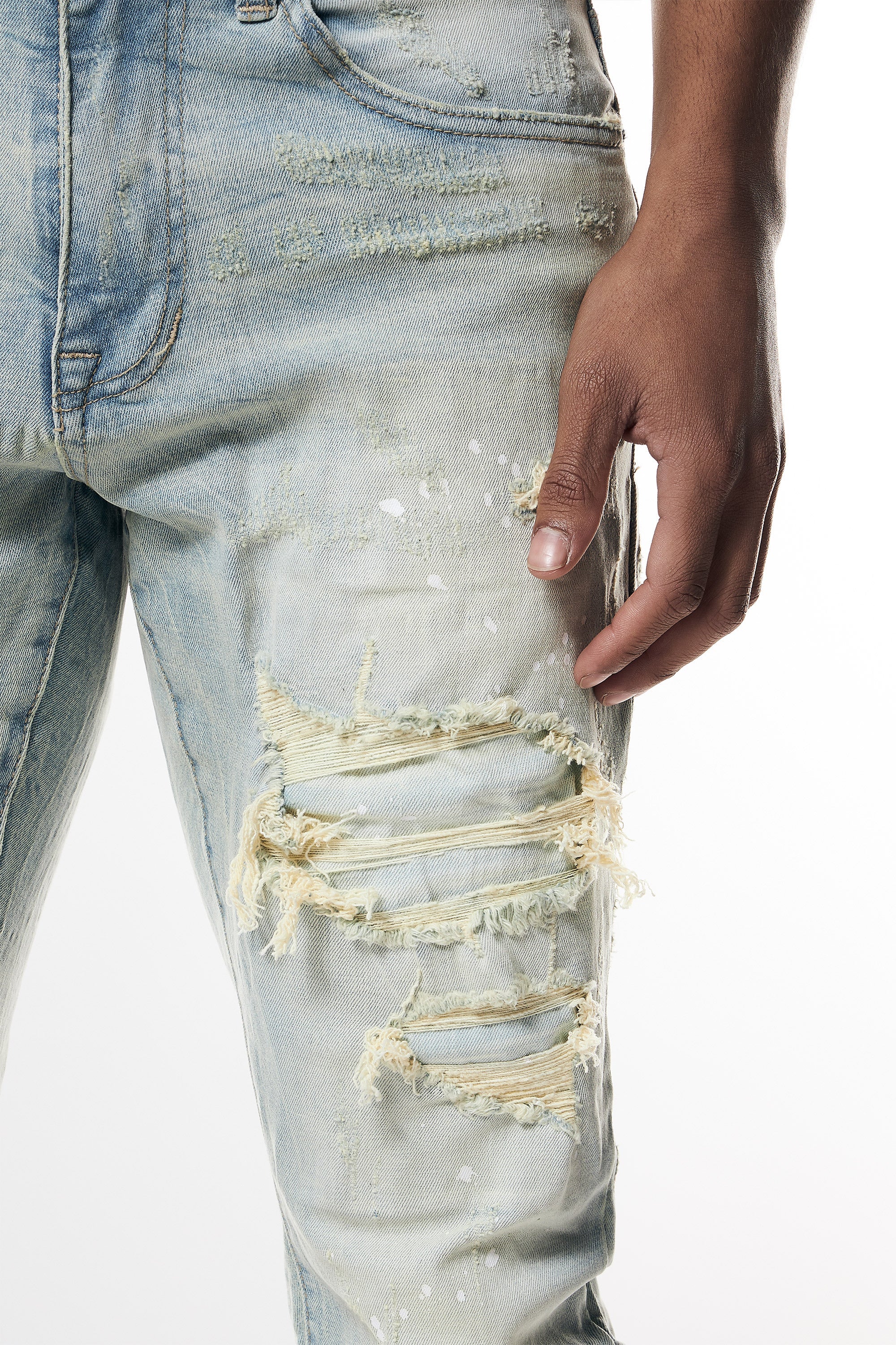 Distressed Rip & Repair Slim Tapered Denim Jeans