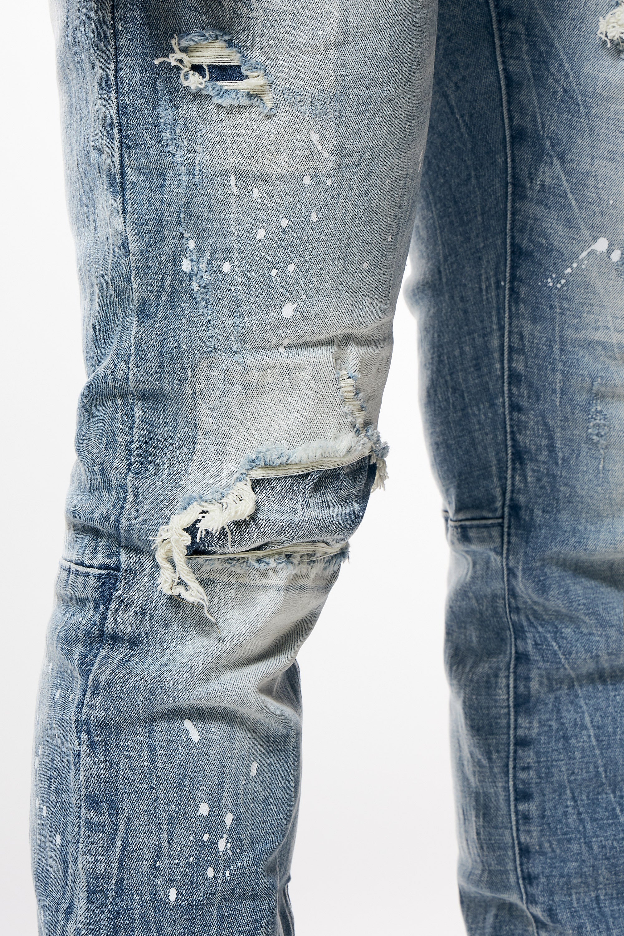 Distressed Rip & Repair Slim Tapered Denim Jeans