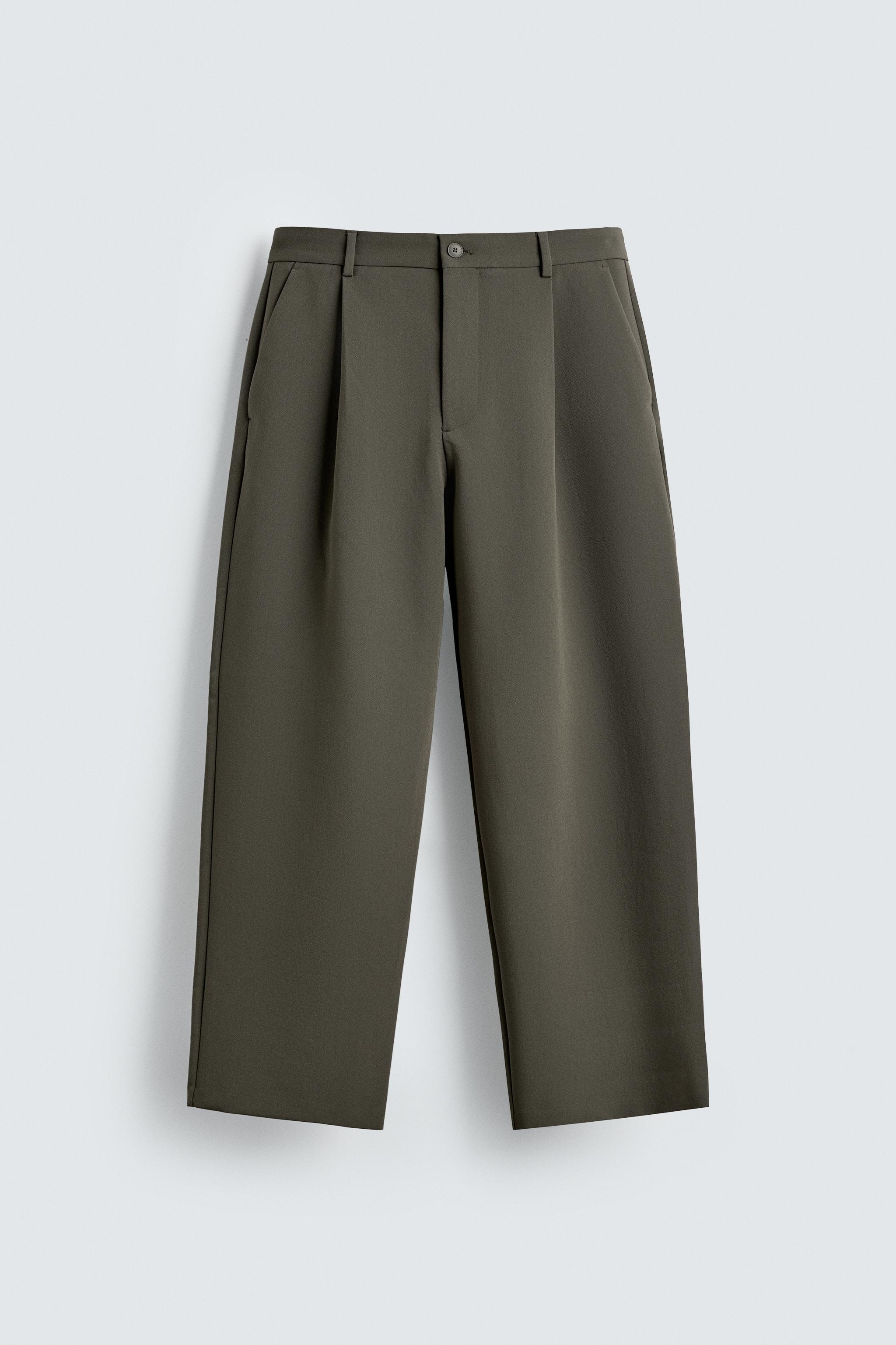 RELAXED FIT PLEATED PANTS