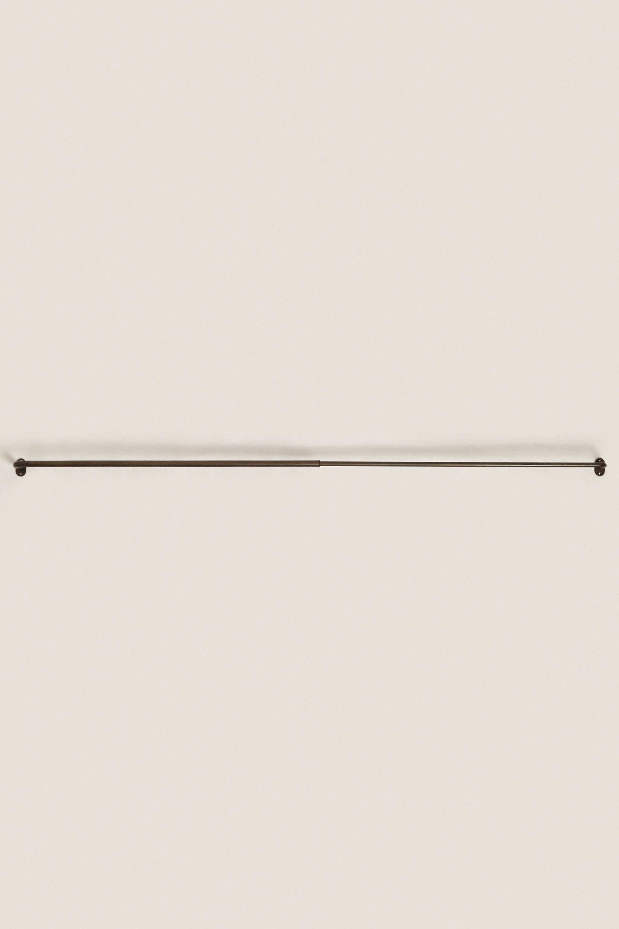 EXTENDIBLE METALLIC CURTAIN RAIL