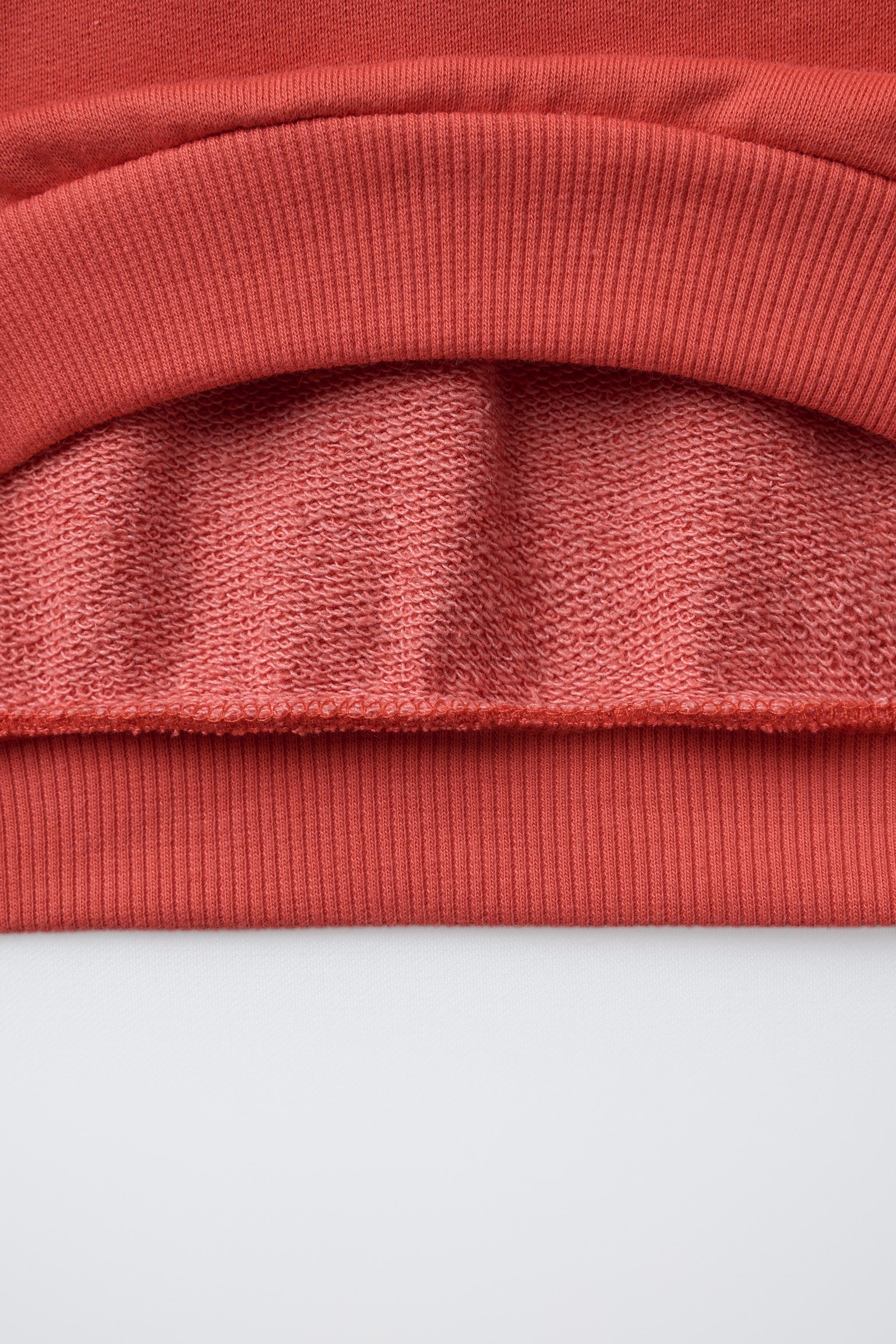 RAGLAN SLEEVE SWEATSHIRT