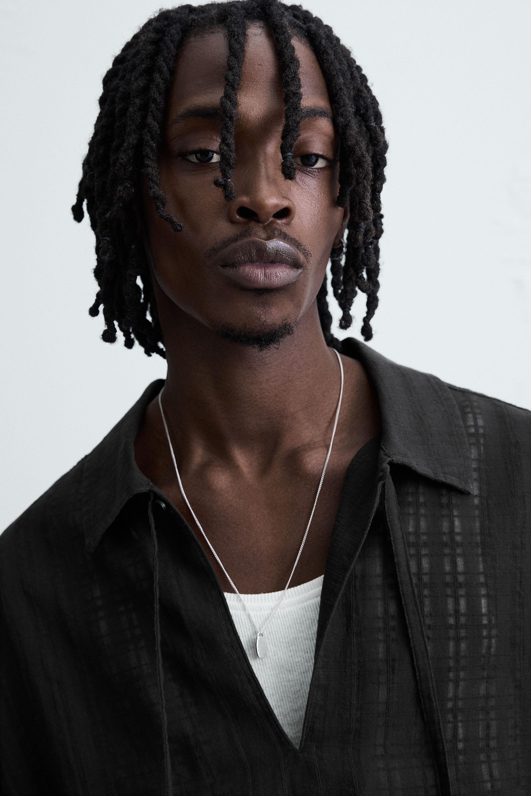 TEXTURED SEMI-SHEER POLO SHIRT