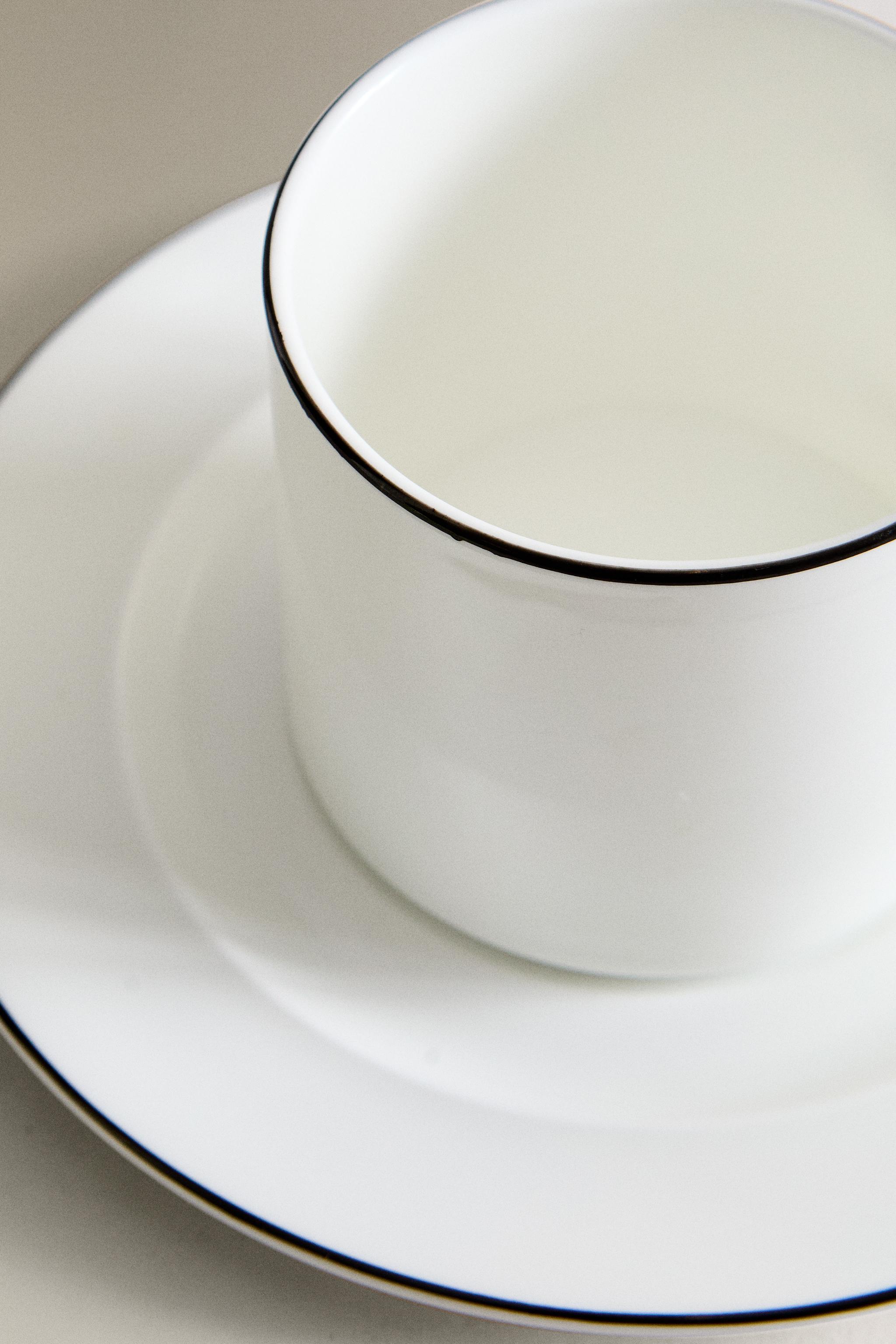 BONE CHINA TEACUP AND SAUCER WITH BLACK RIM