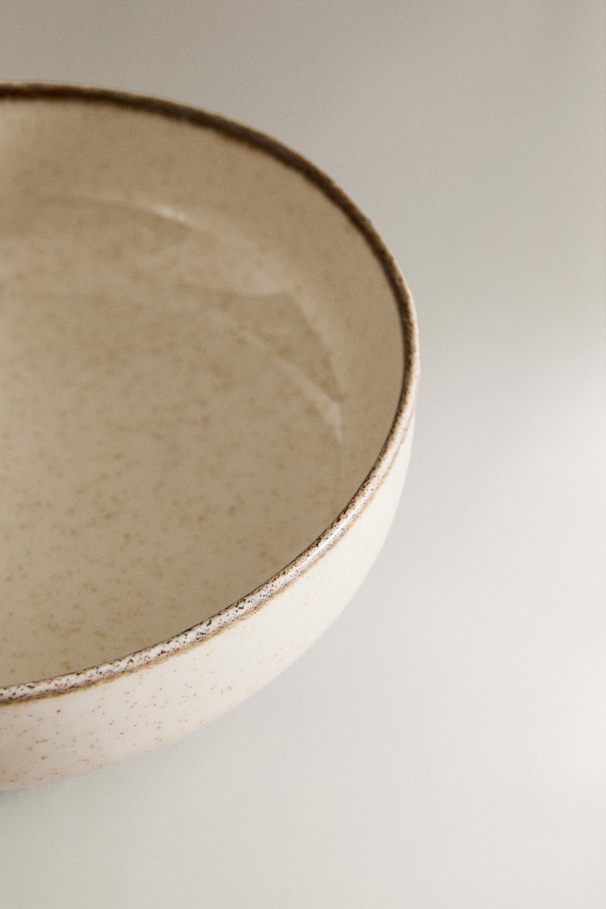 PORCELAIN BOWL WITH ANTIQUE FINISH RIM