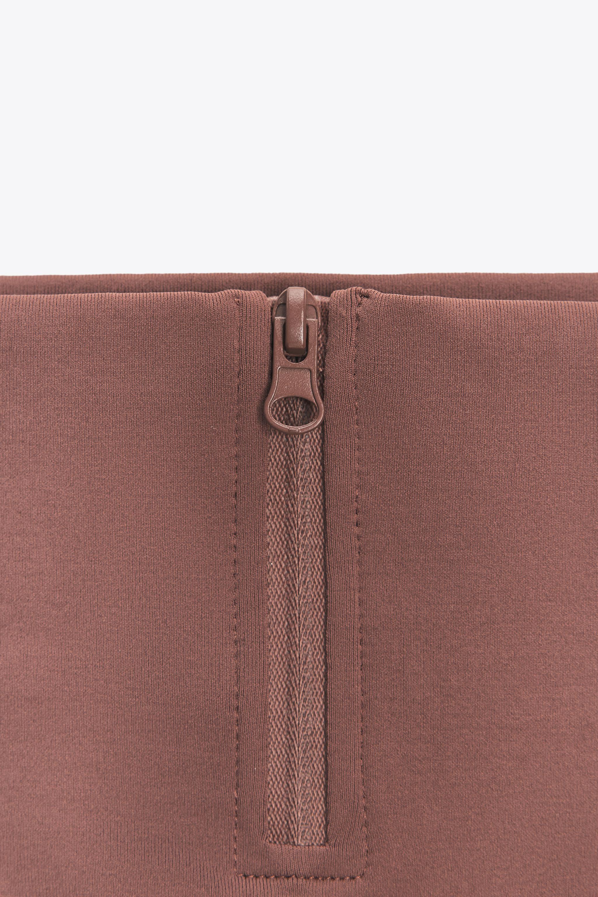 SEAMLESS ZIPPERED LEGGINGS