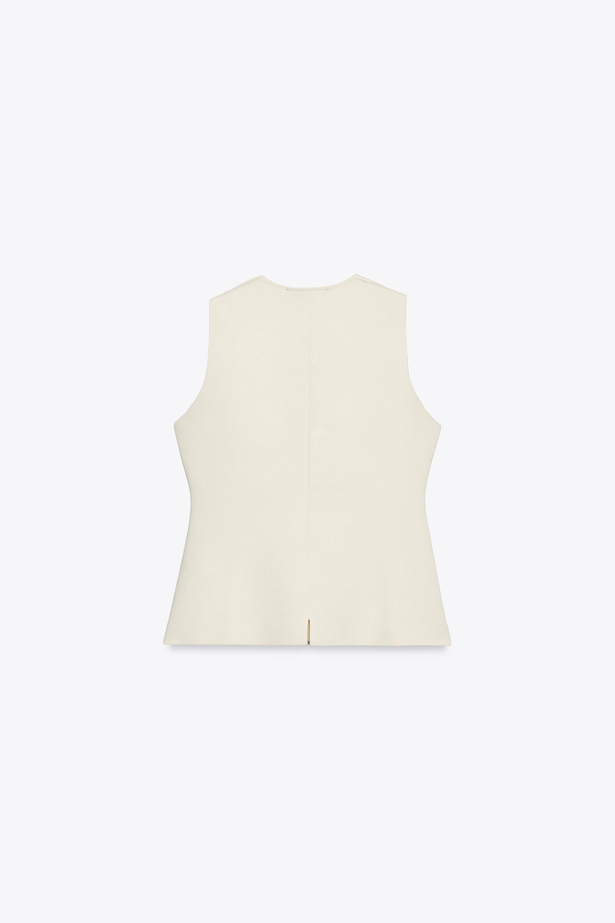 COVERED BUTTON KNIT VEST