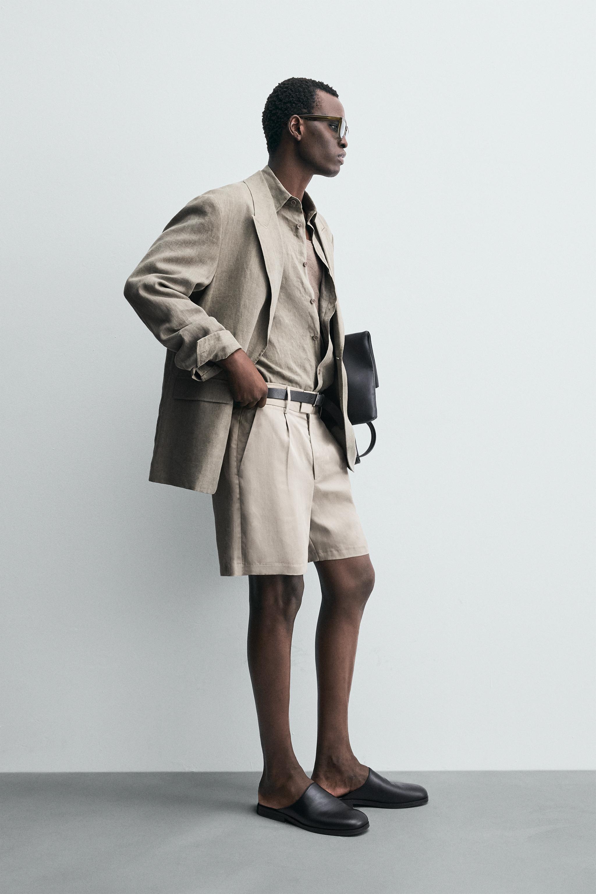 RELAXED FIT PLEATED SHORTS