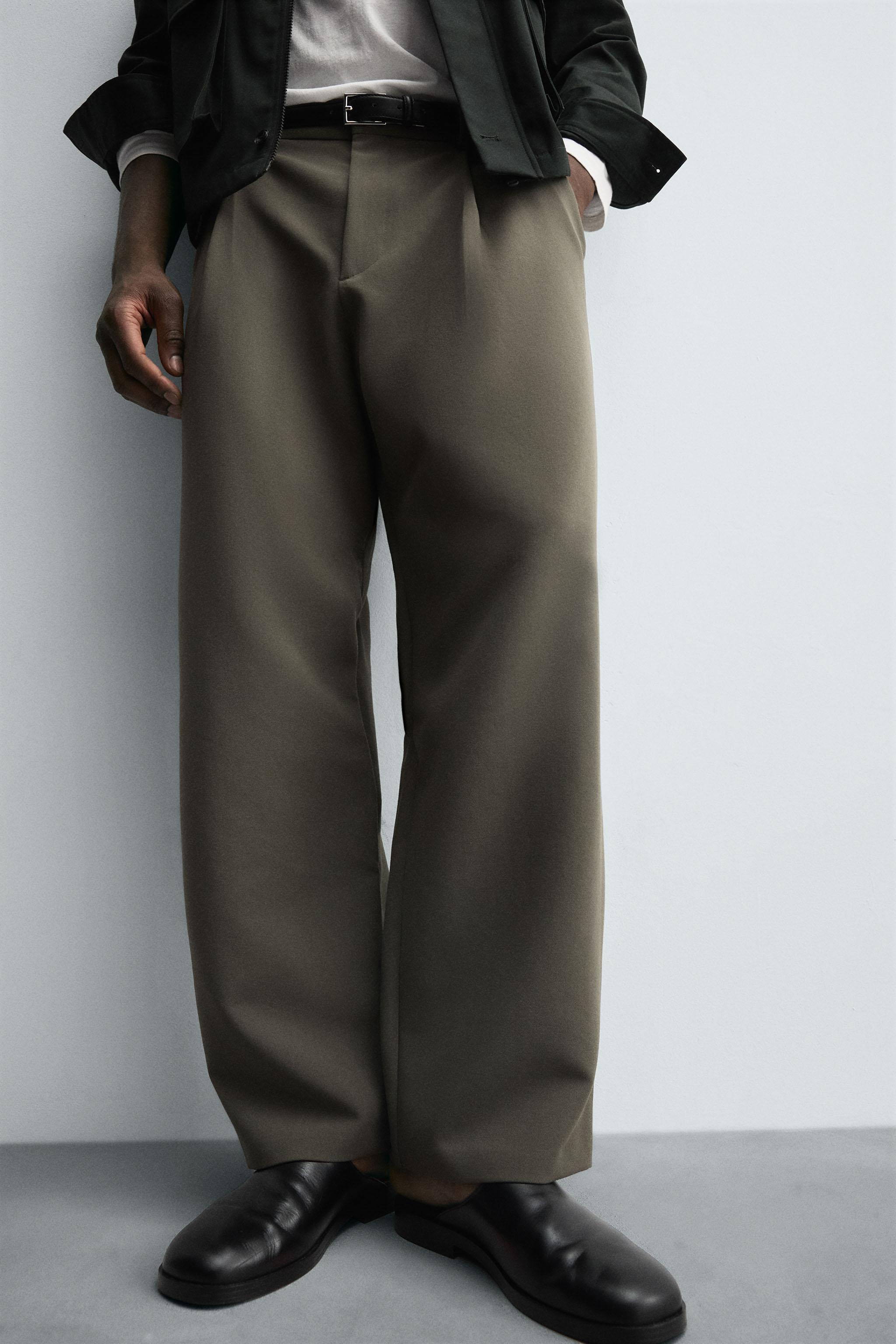 RELAXED FIT PLEATED PANTS