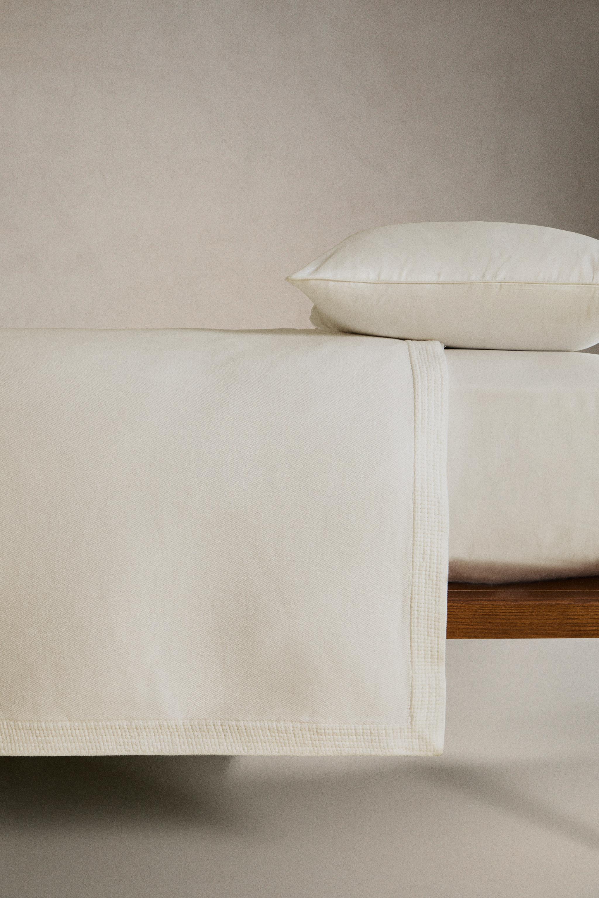 EMBROIDERED BEDSPREAD