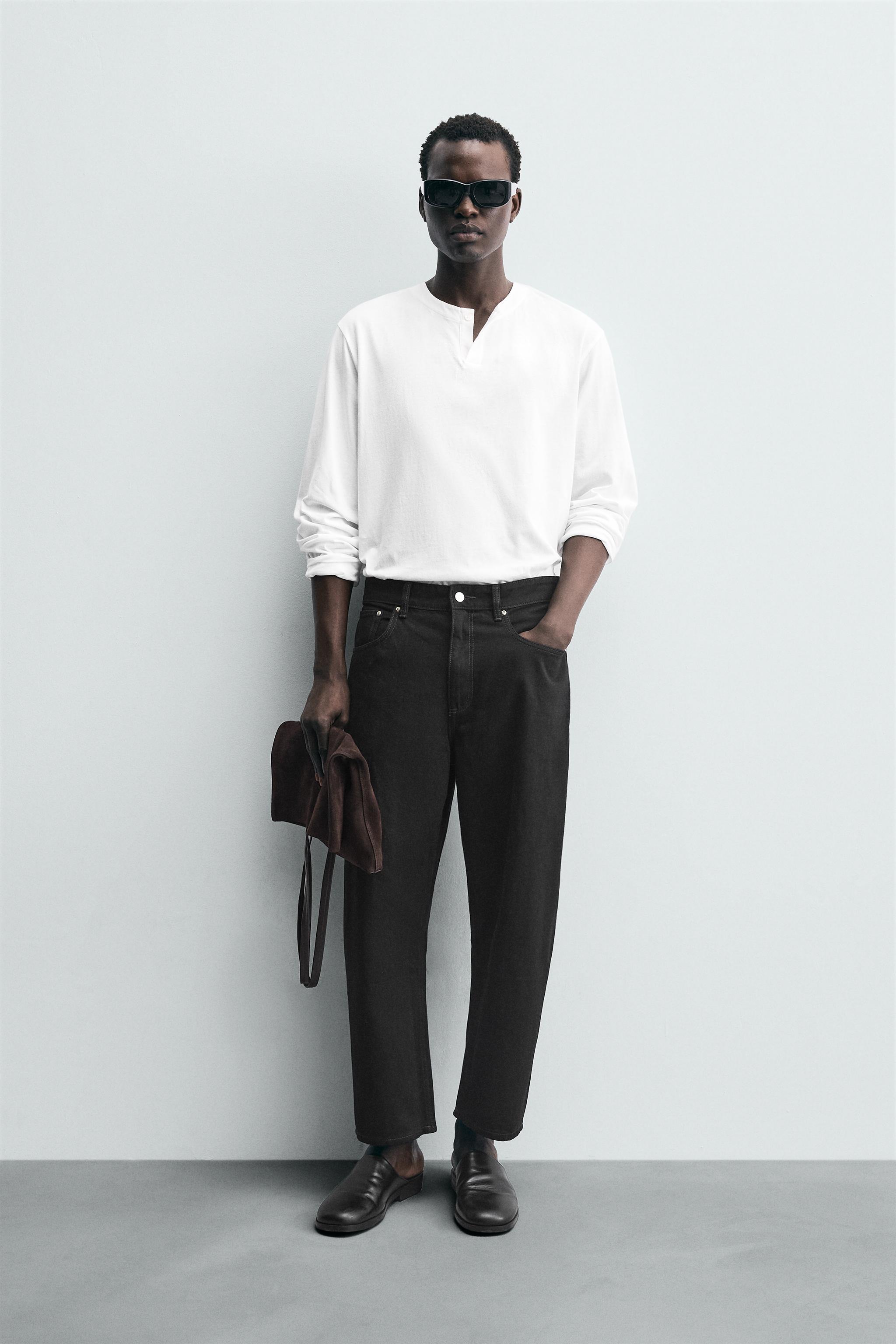 TAPERED WIDE FIT JEANS