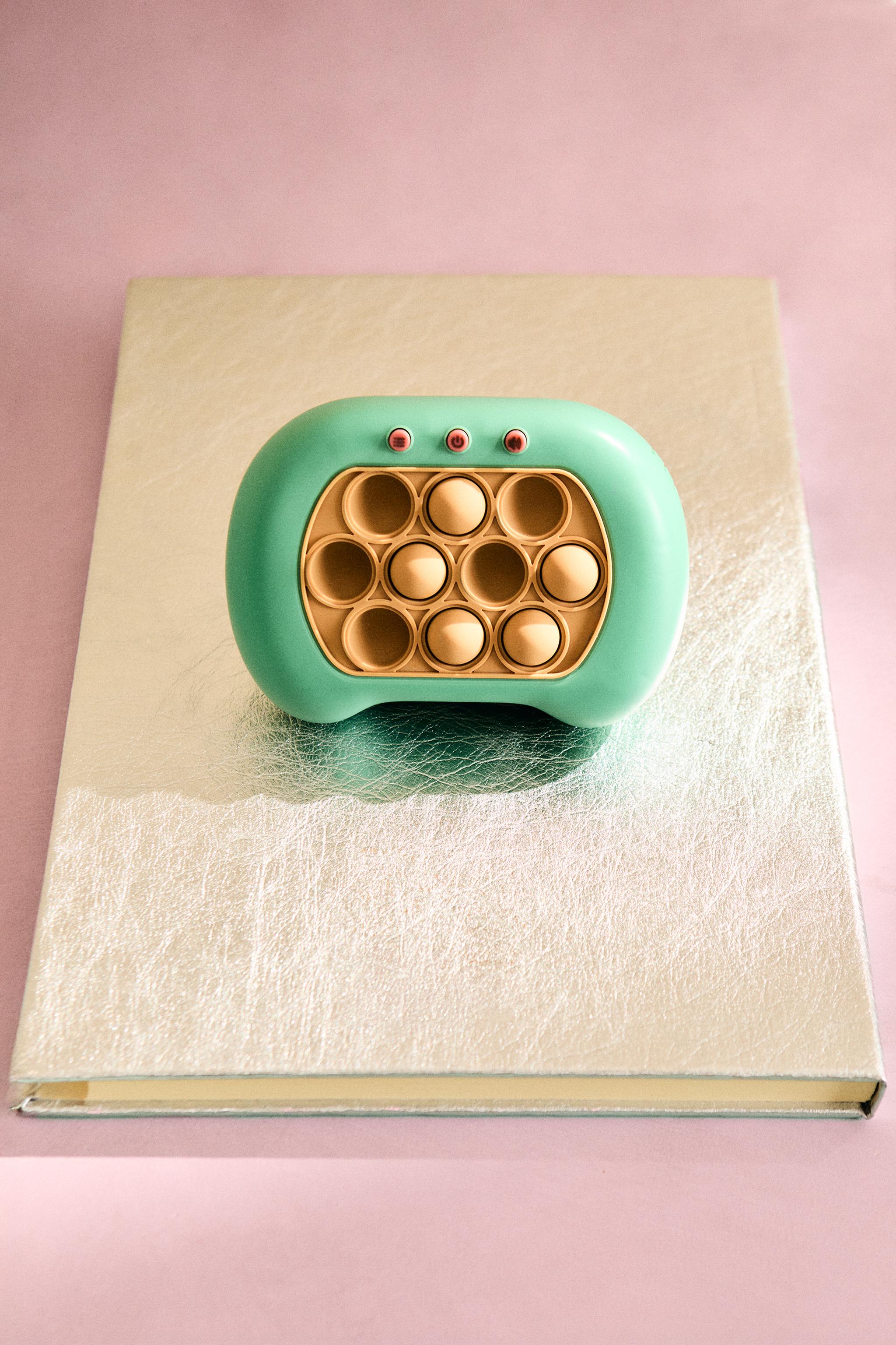 CHILDREN'S ELECTRONIC POP IT TOY