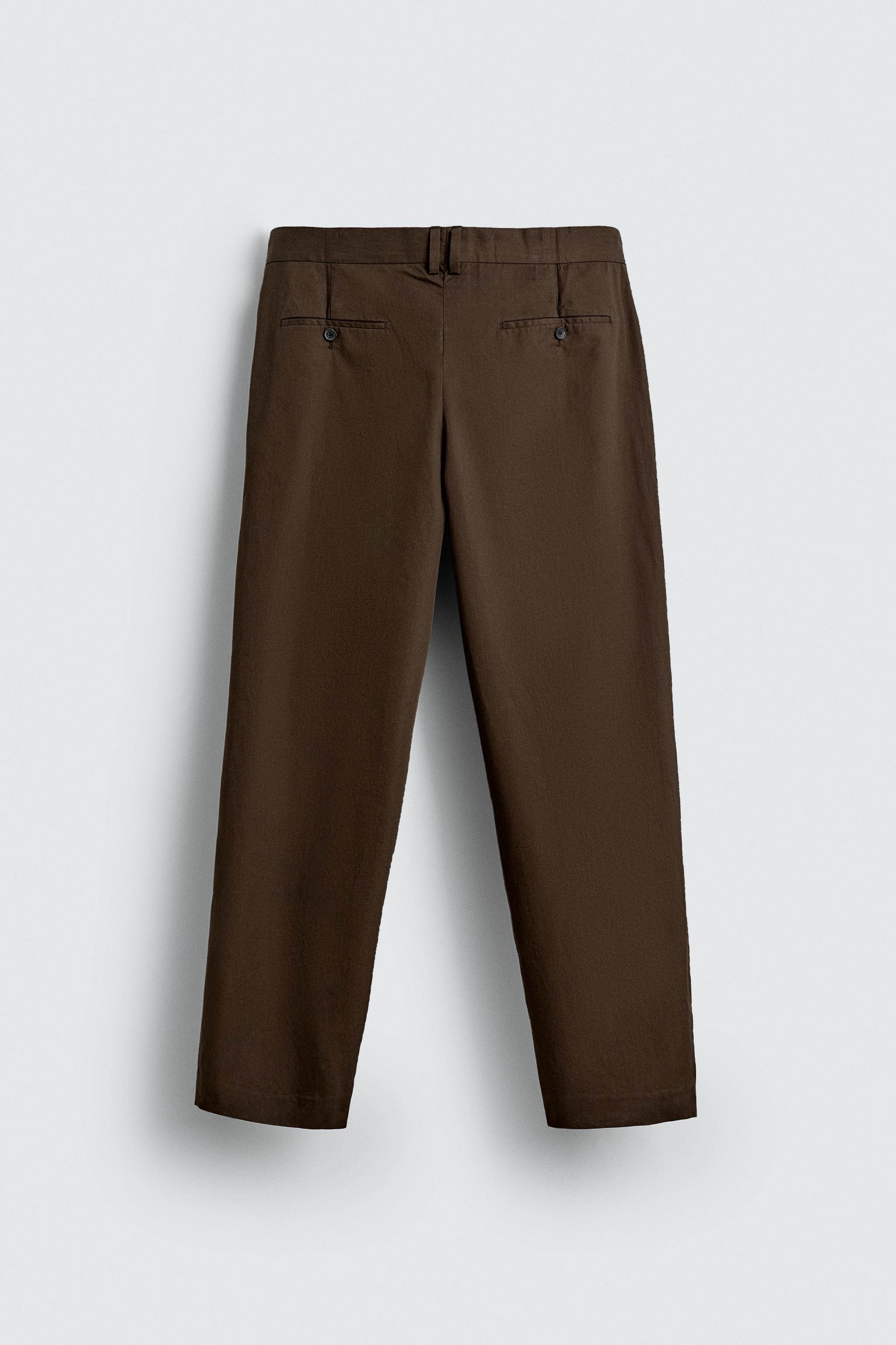 LIMITED EDITION PLEATED CHINO PANTS