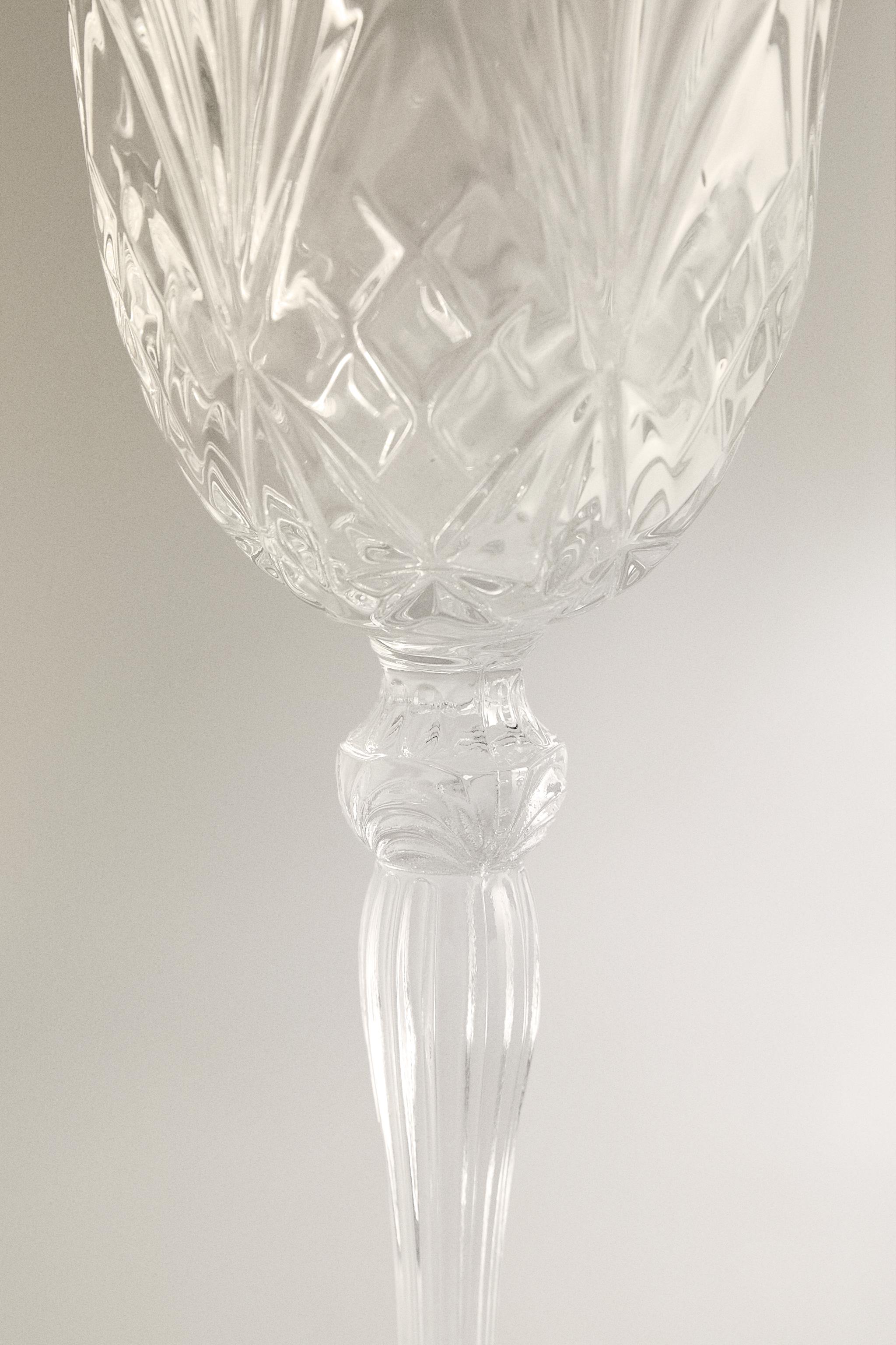 CARVED CRYSTALLINE GLASS