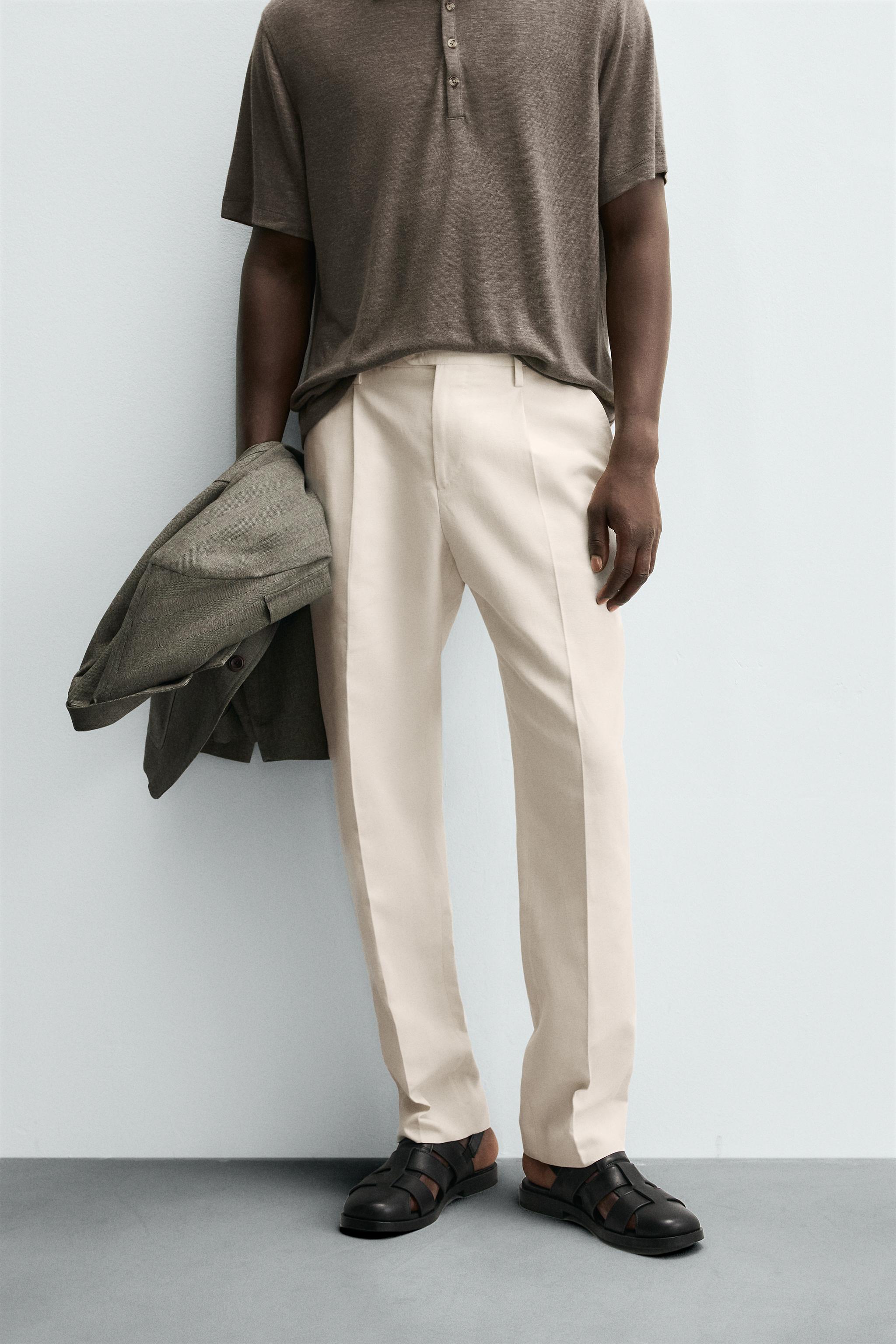 REGULAR FIT PLEATED PANTS