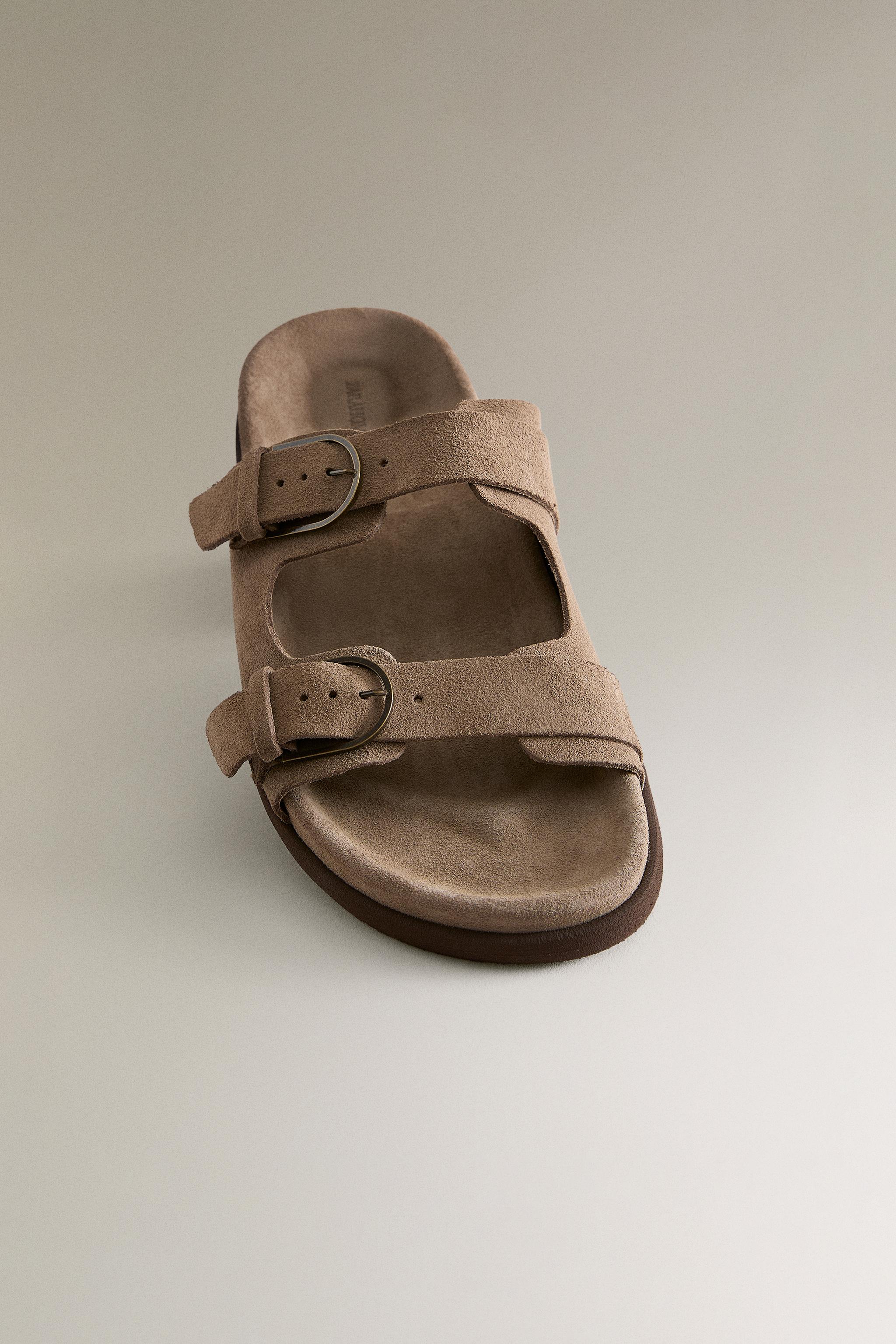 FLAT LEATHER SANDALS WITH BUCKLES