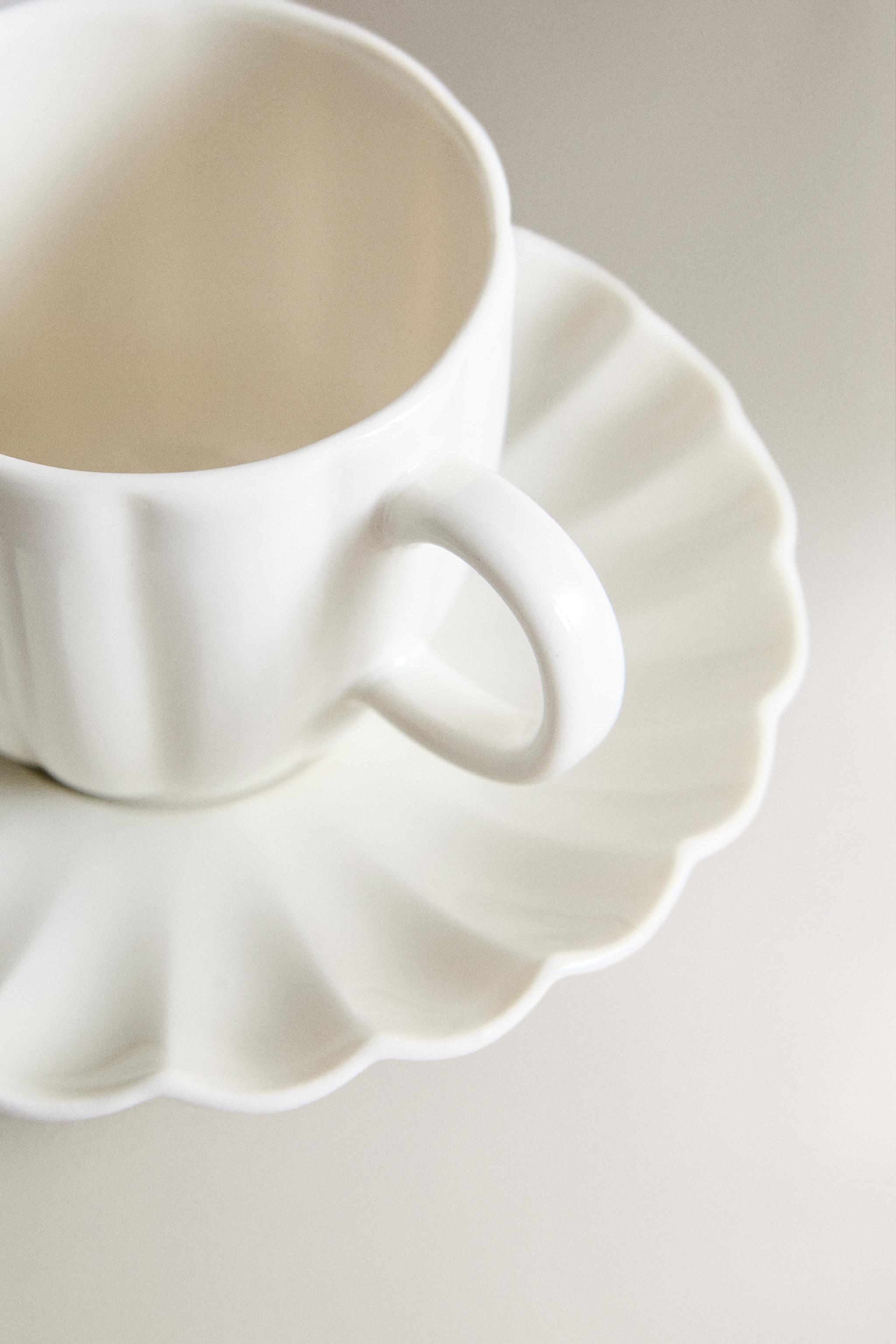 SCALLOPED PORCELAIN MUG AND SAUCER