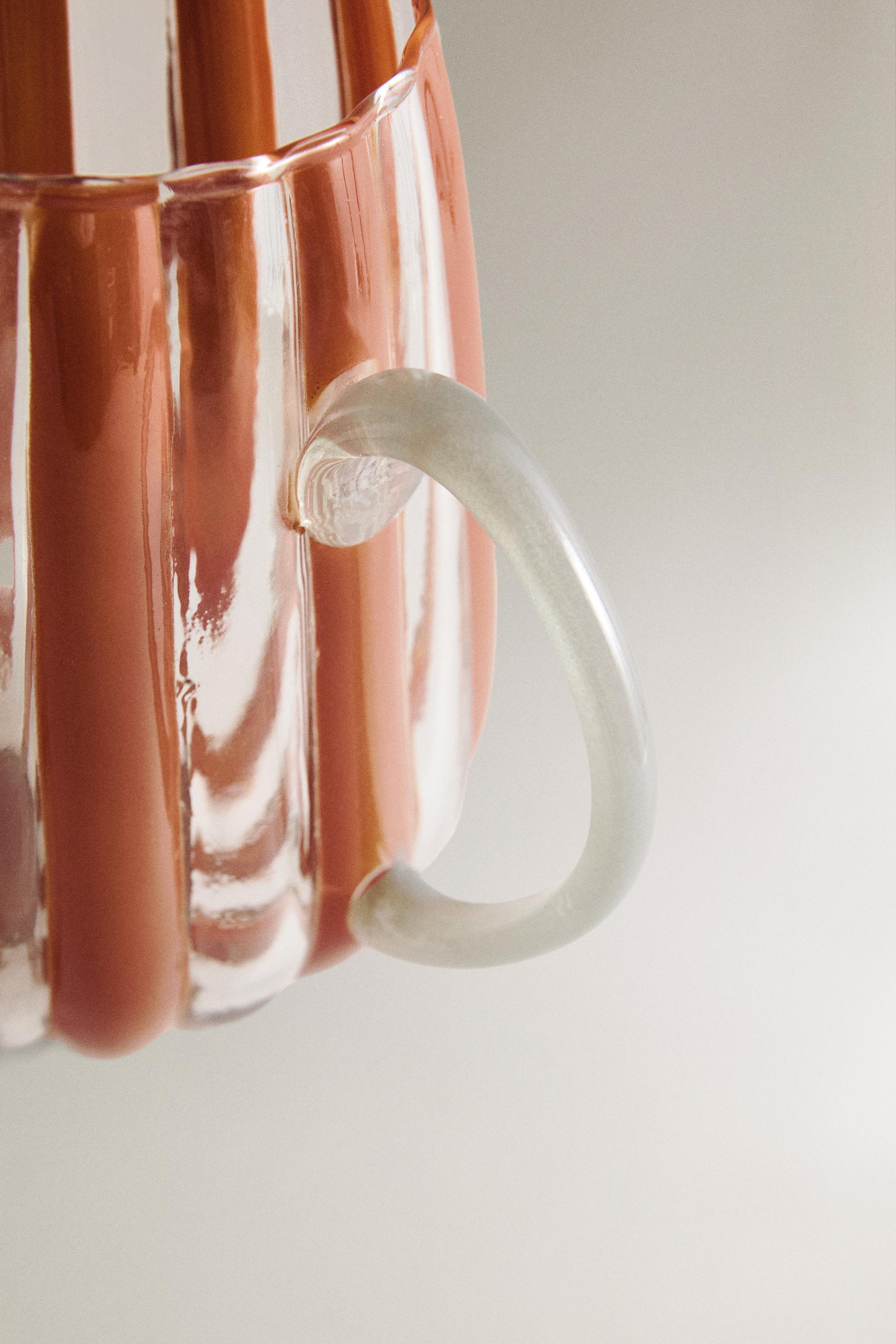 GLASS PITCHER WITH STRIPED HANDLE AND CONTRAST