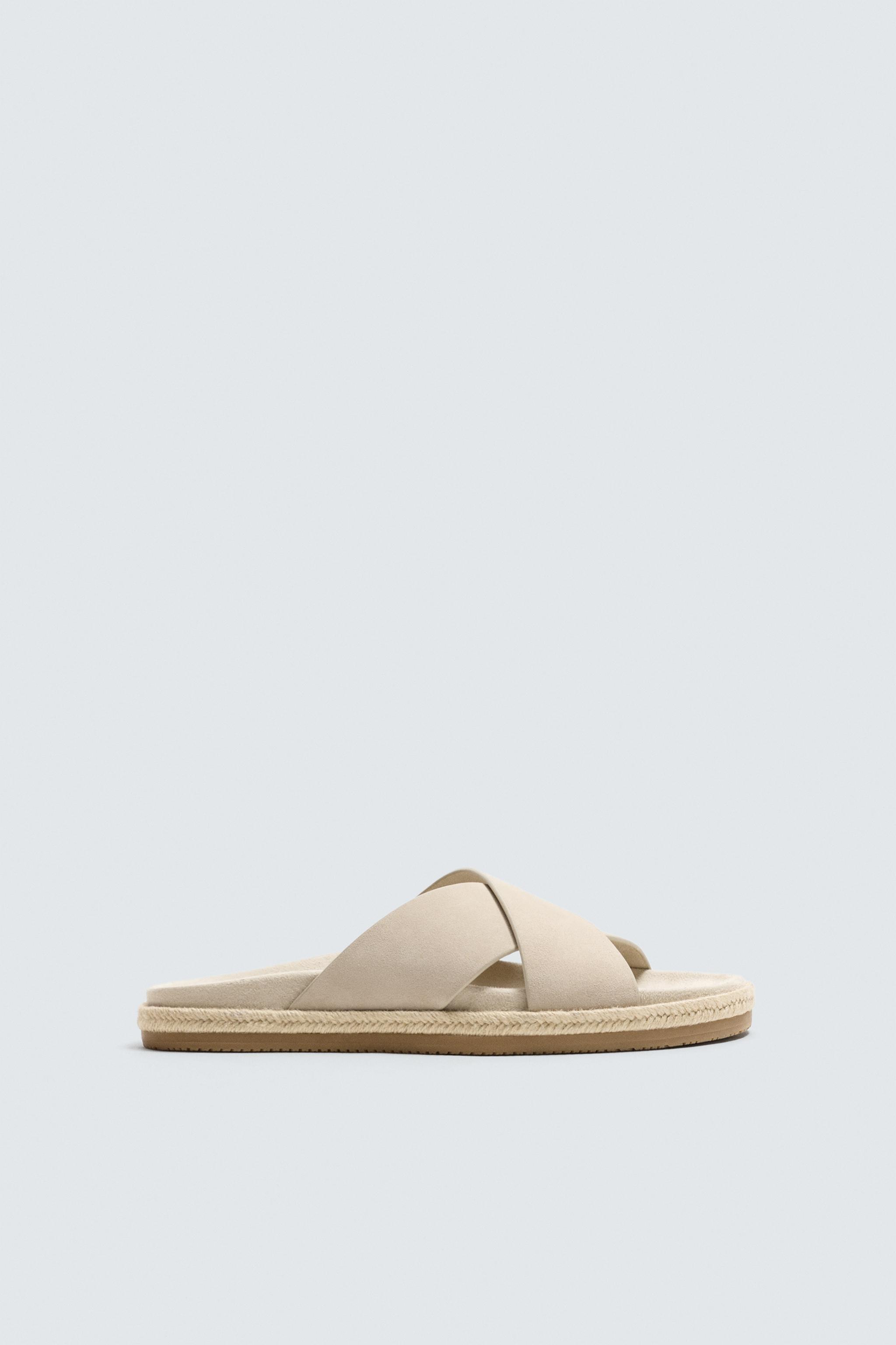 CROSSED LEATHER SANDALS