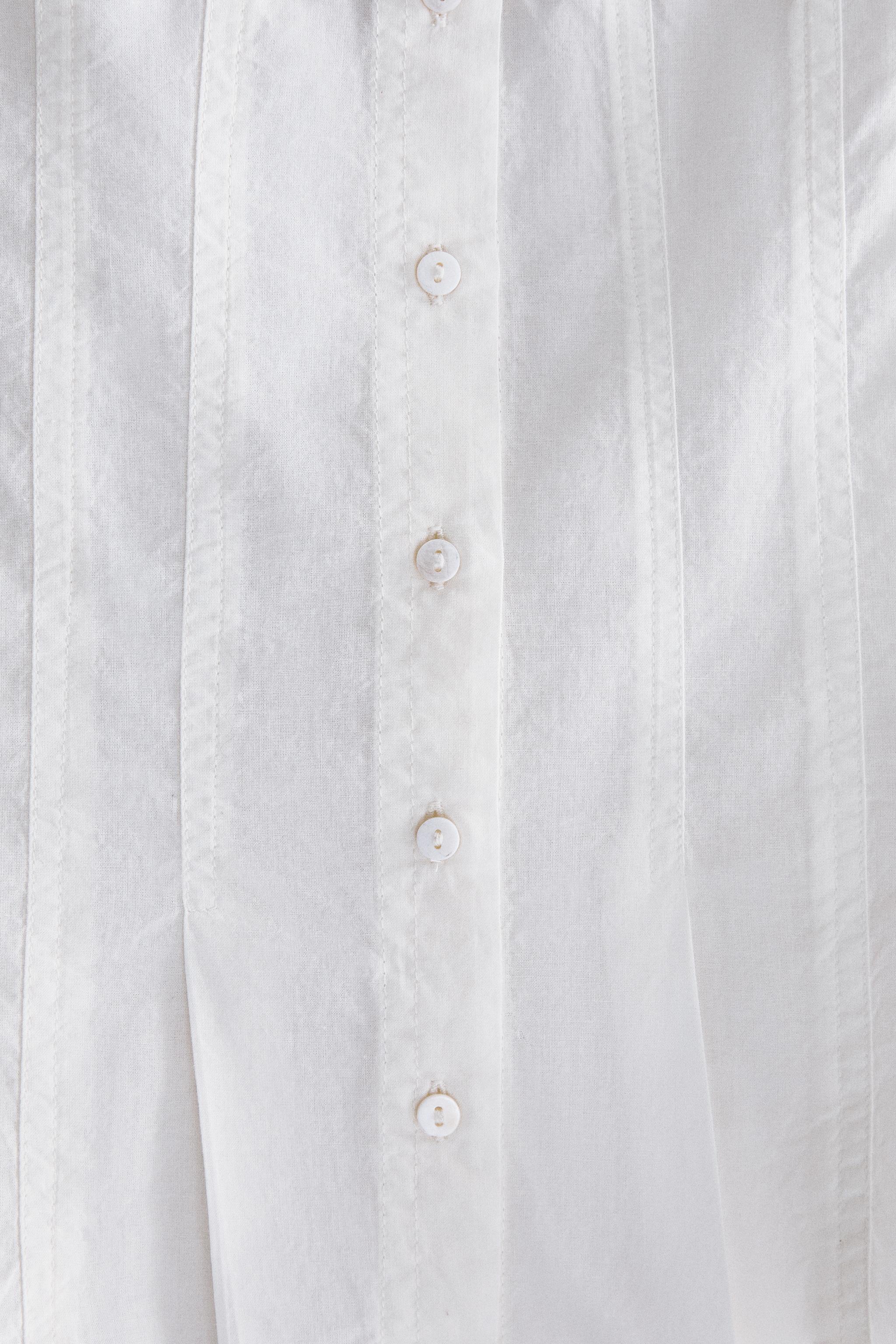 COTTON TOP WITH SEAM DETAILS