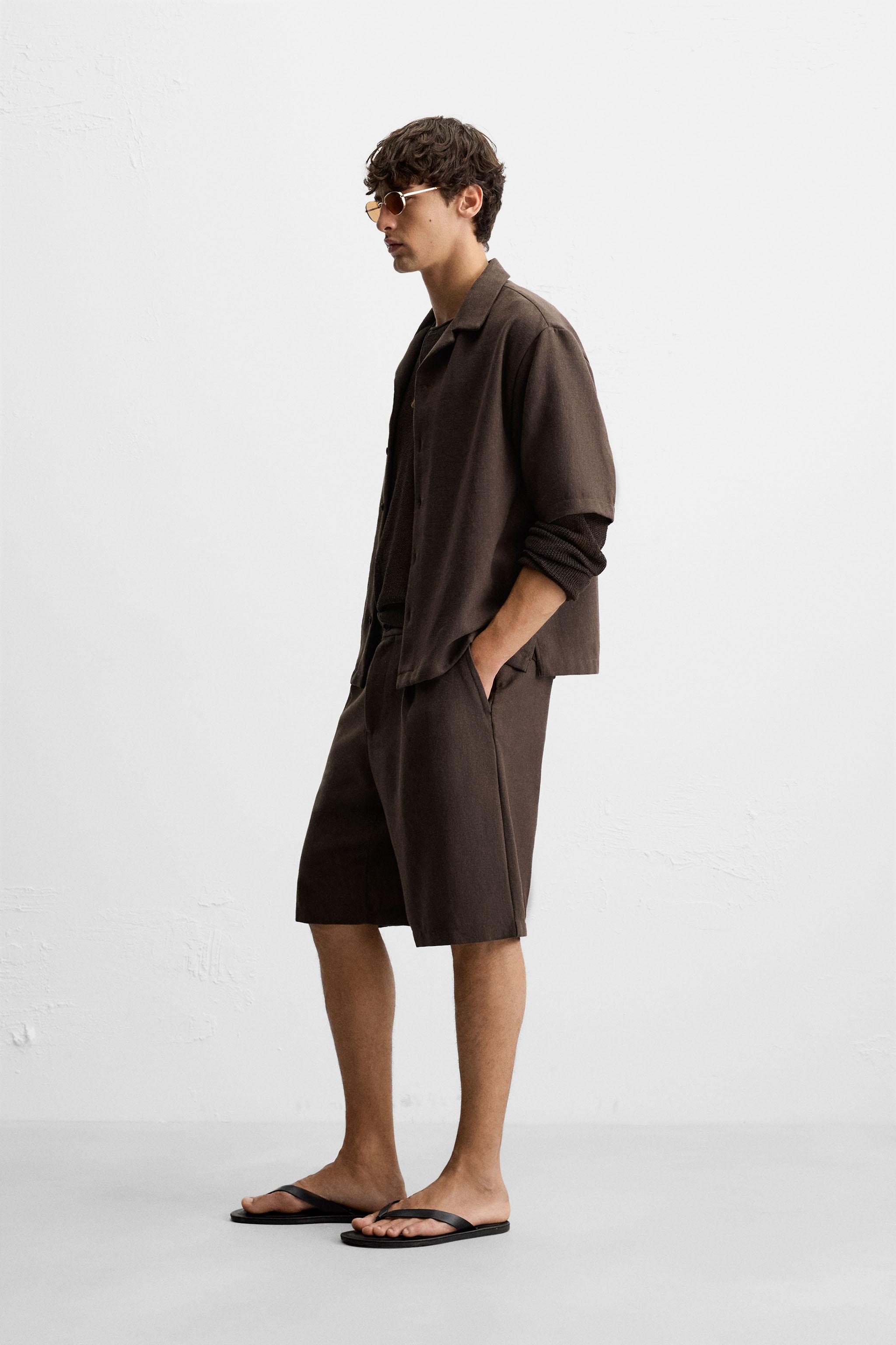 TEXTURED PLEATED SHORTS