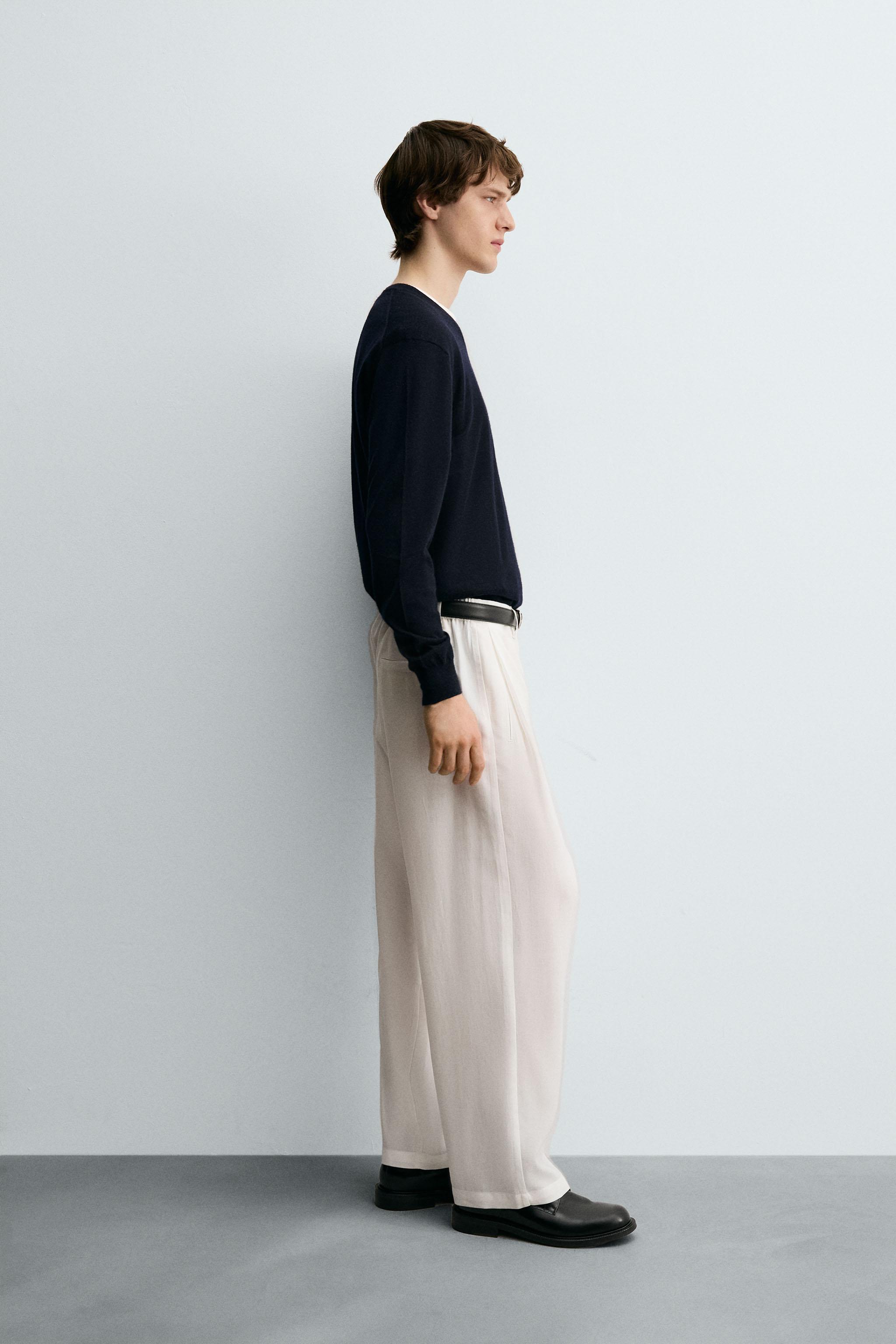FLOWY PANTS WITH SIDE PLEATS