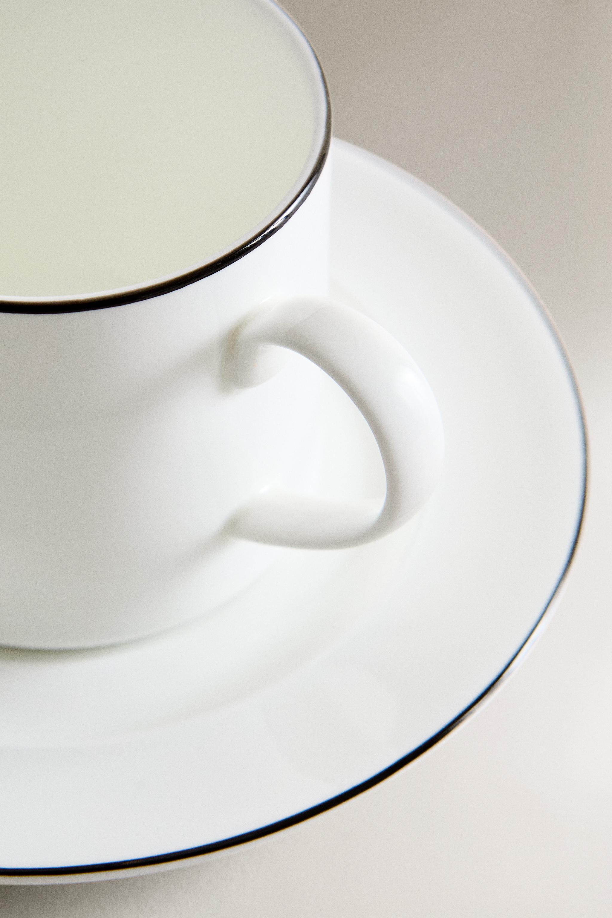 BONE CHINA TEACUP AND SAUCER WITH BLACK RIM