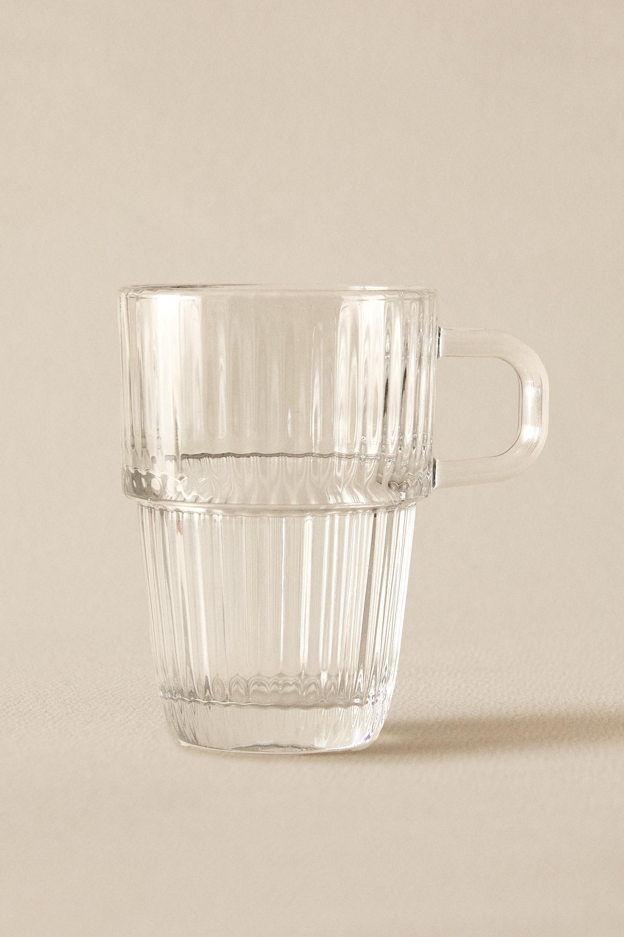 GLASS MUG WITH A RAISED DESIGN