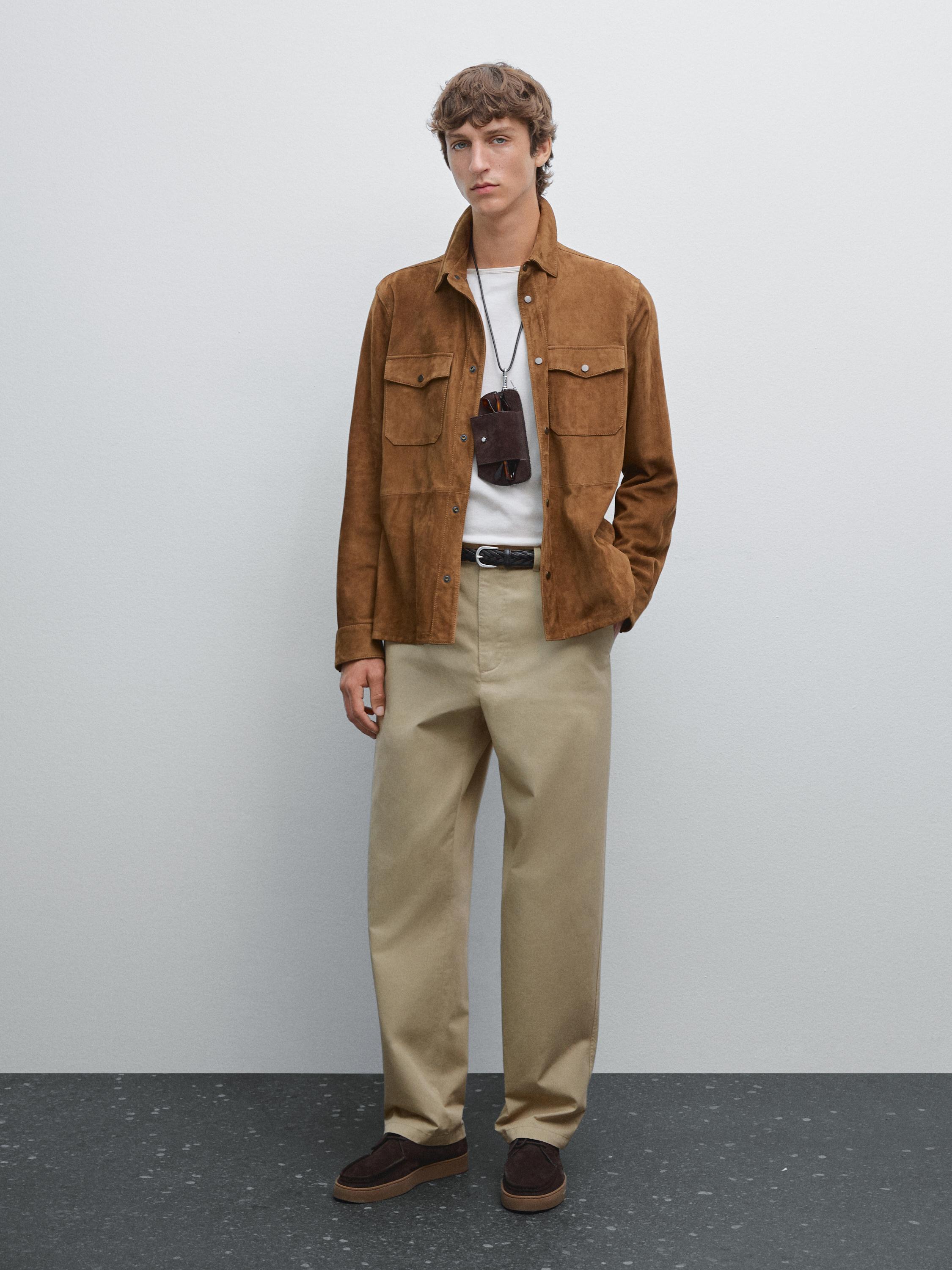 Trousers with patch pocket