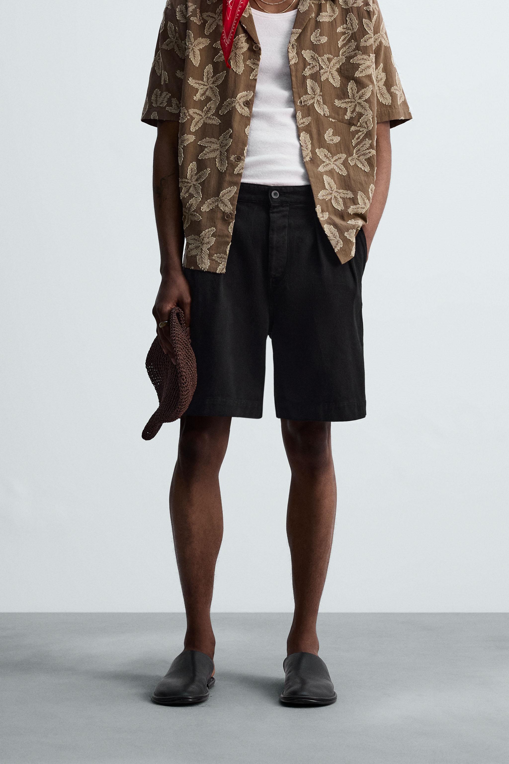 RELAXED FIT PLEATED BERMUDA SHORTS