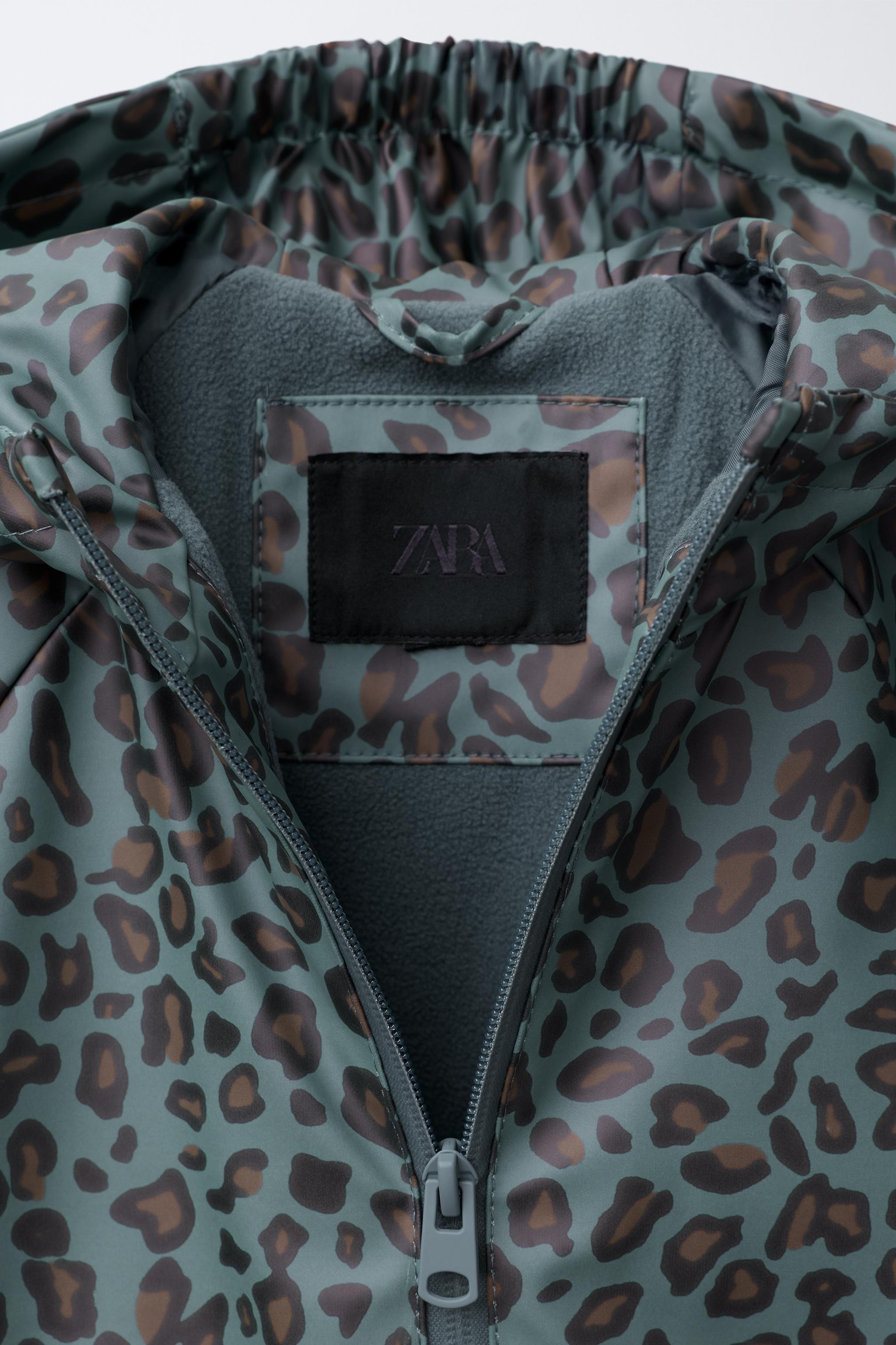 ANIMAL PRINT RUBBERIZED WATER-RESISTANT RAINCOAT