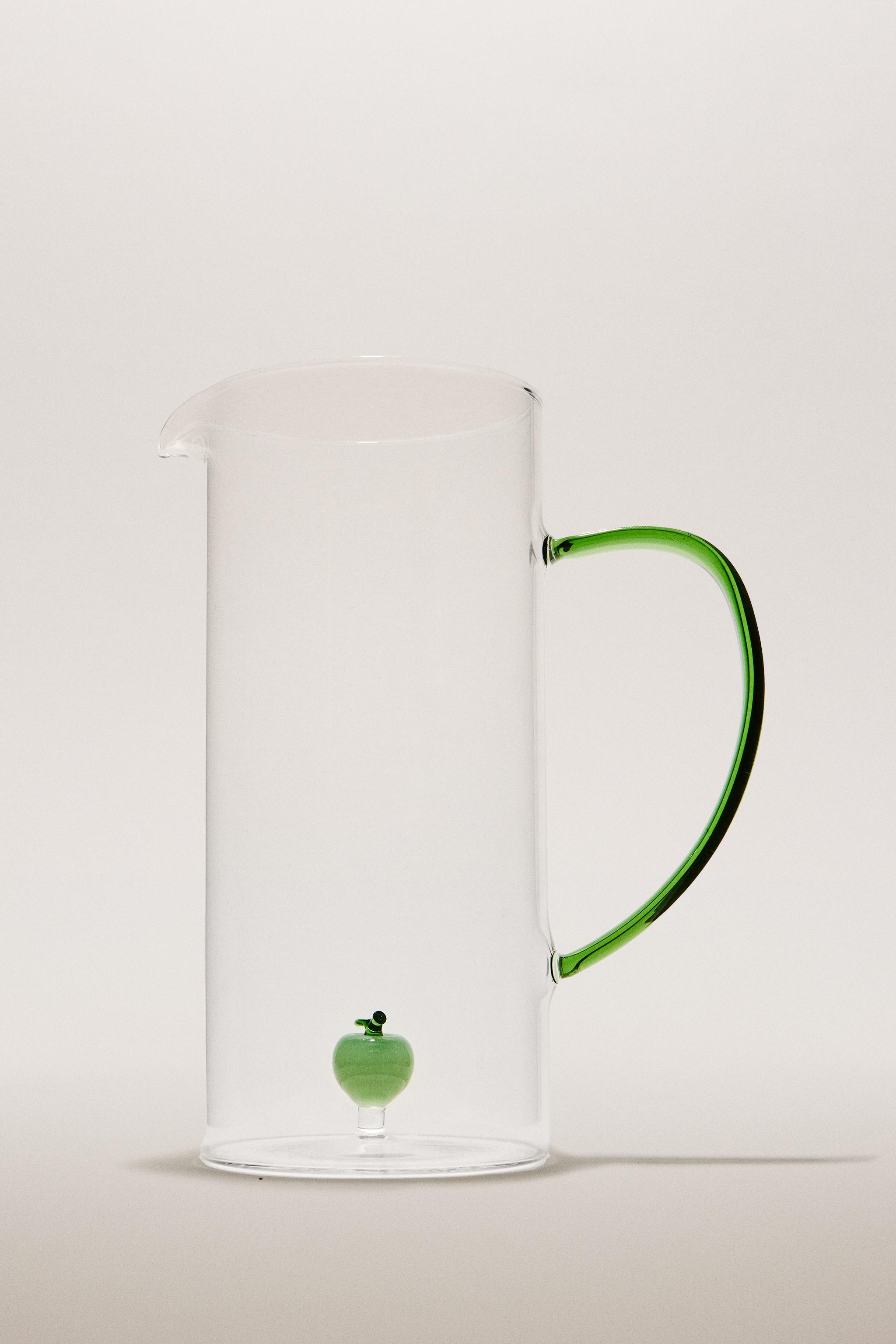 GLASS PITCHER WITH HANDLE AND APPLE DETAIL