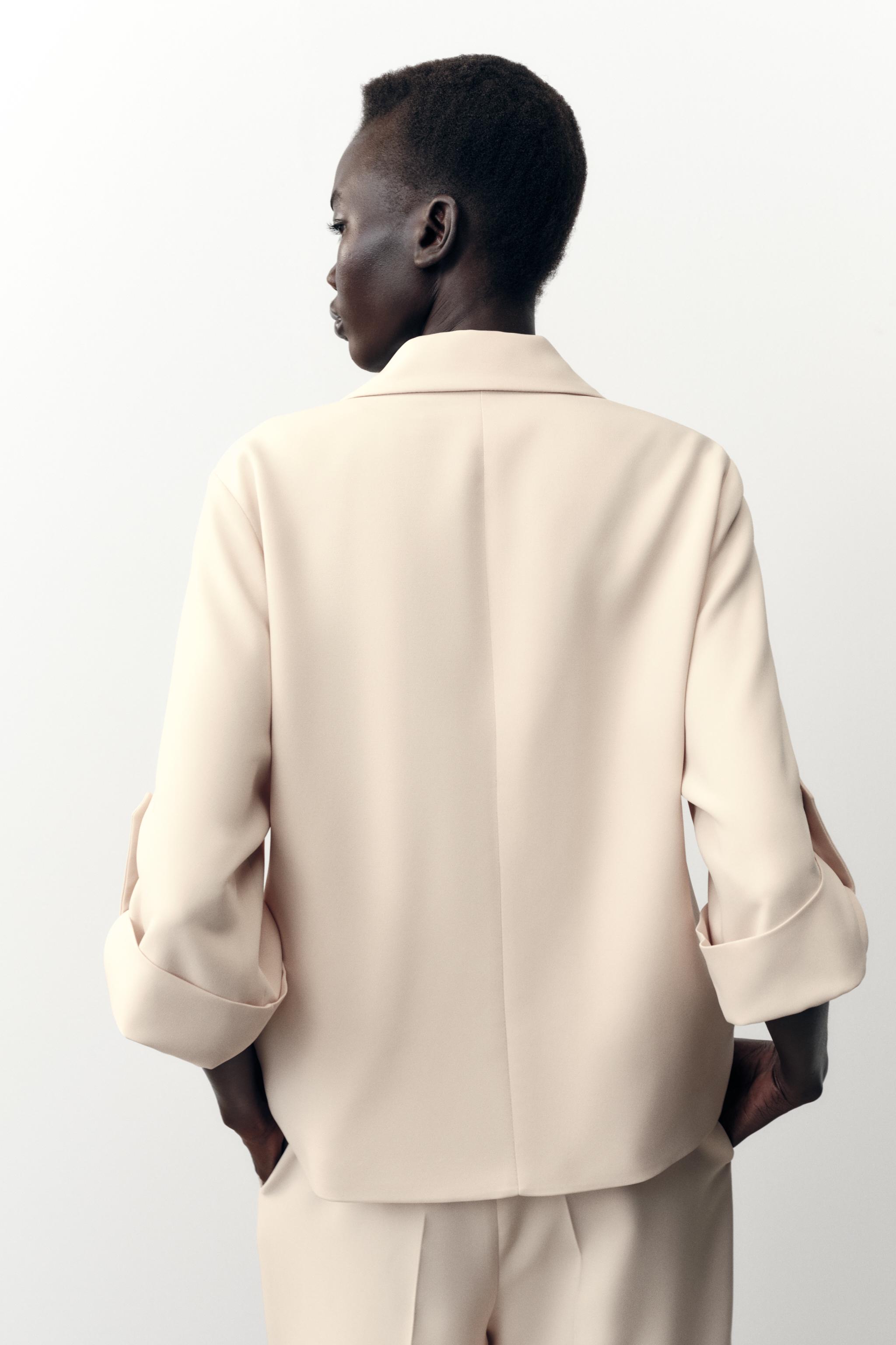 DOUBLE BREASTED BLAZER WITH TABBED SLEEVES