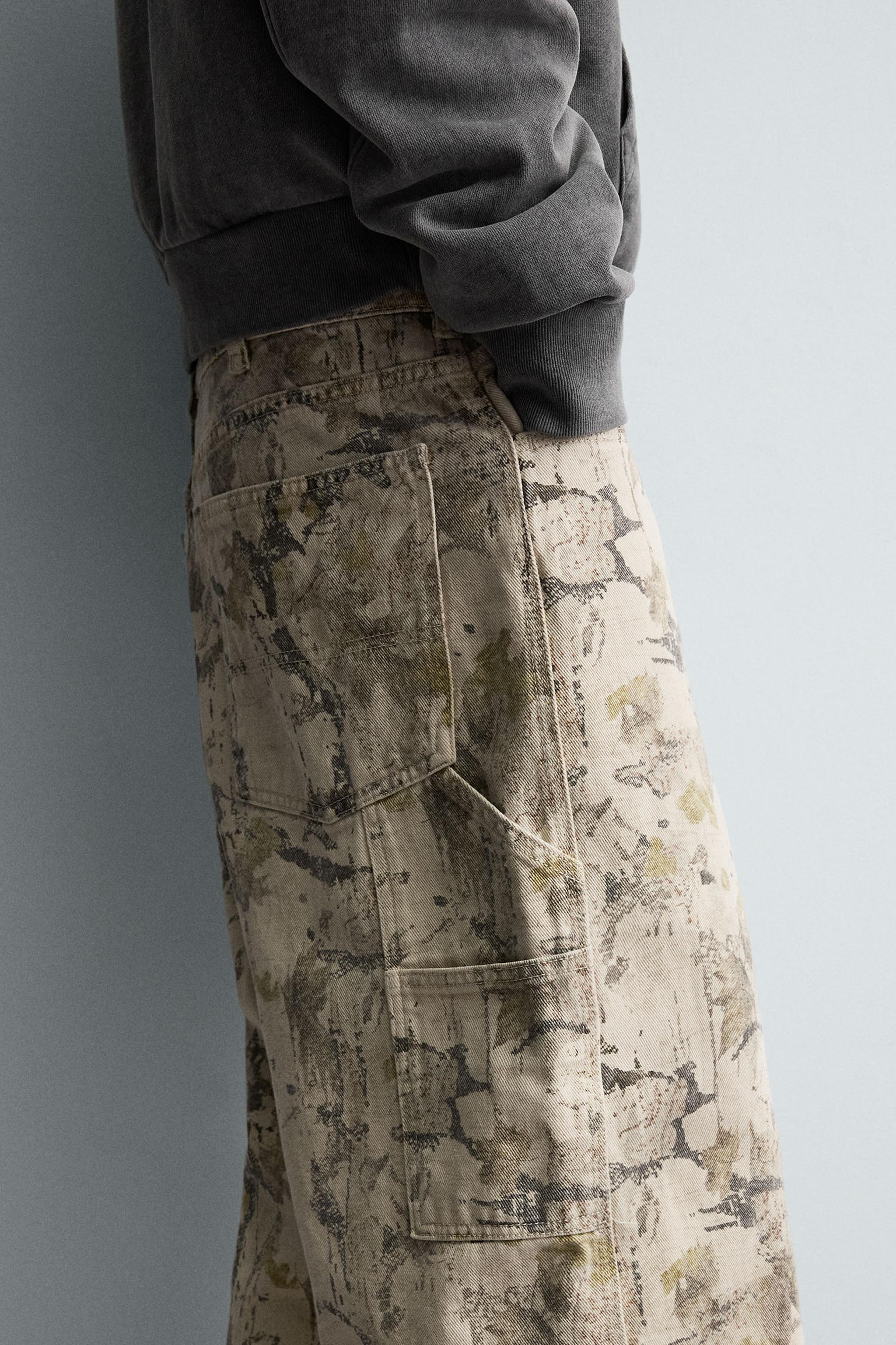 ABSTRACT PRINT BAGGY FIT CARPENTER PANTS