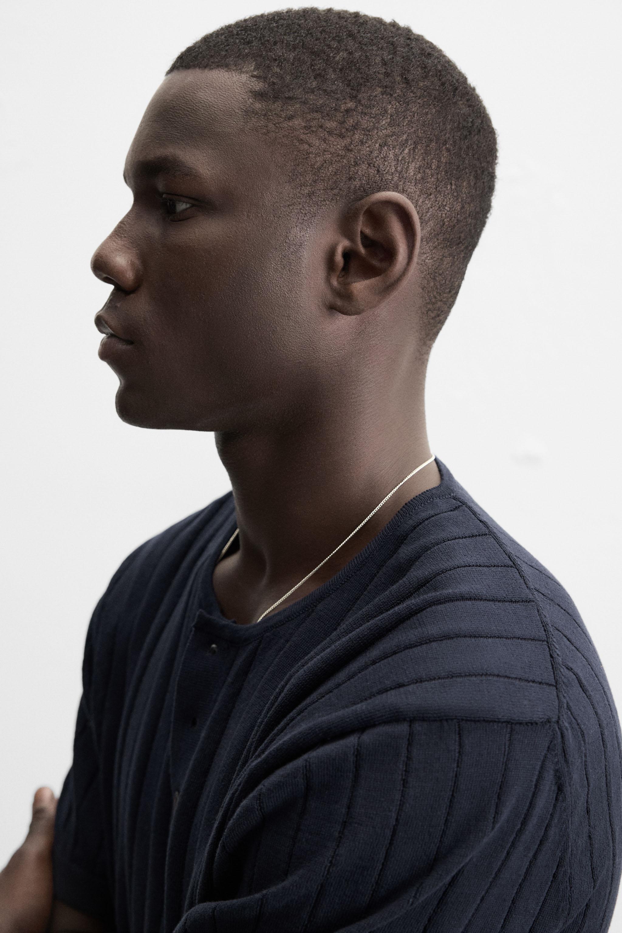 KNIT T-SHIRT WITH BUTTONED NECK