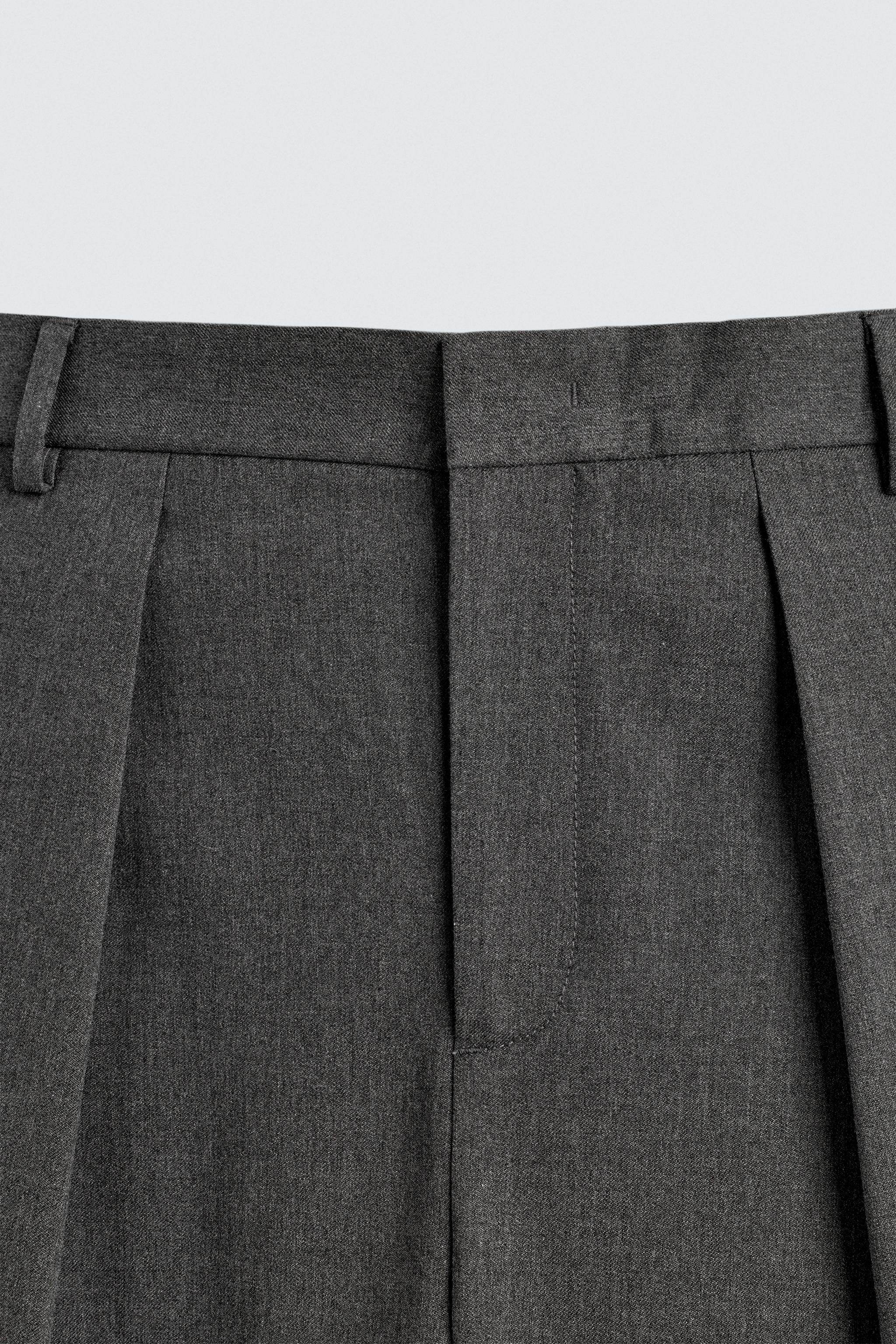 PLEATED WIDE FIT PANTS