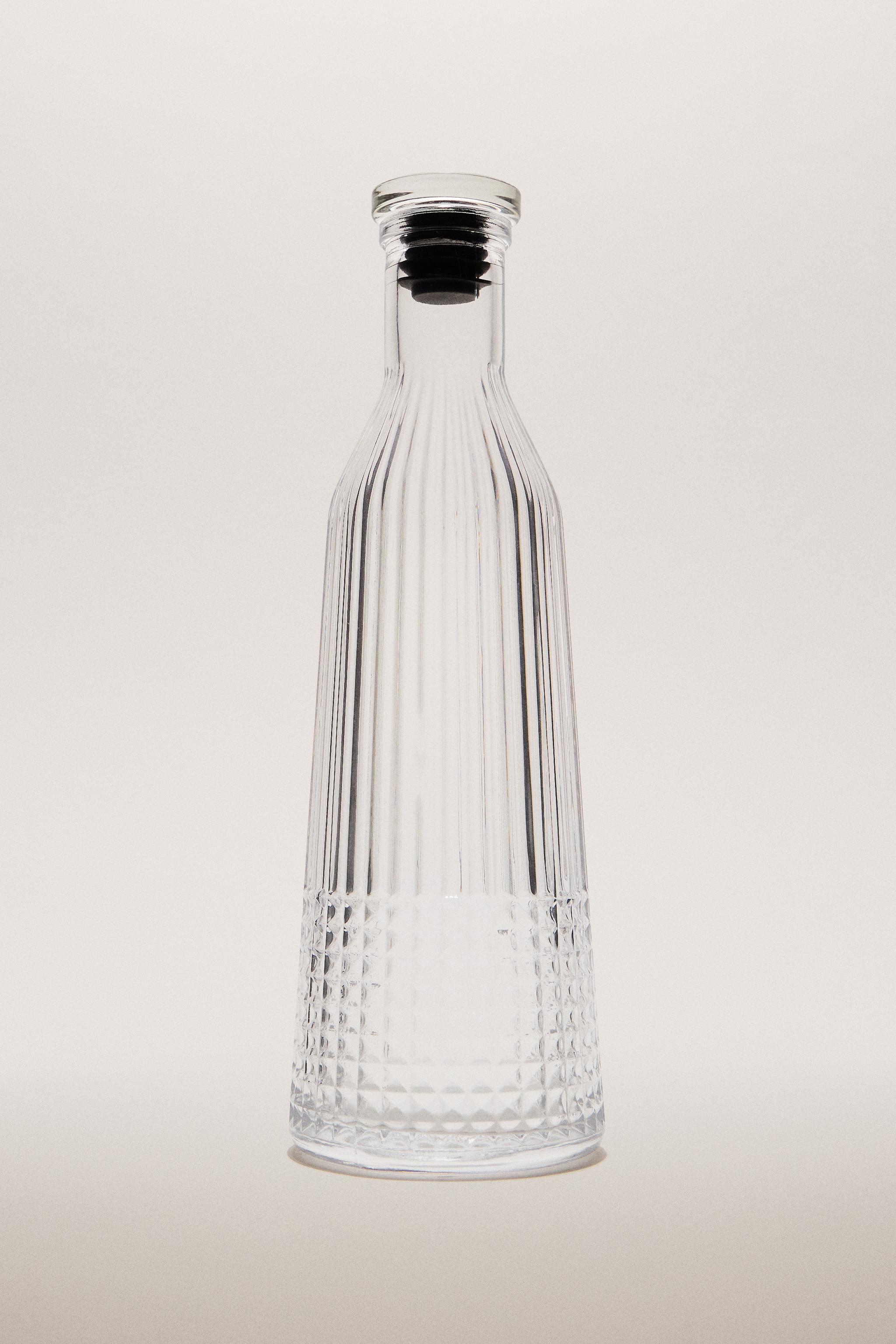 RAISED DESIGN GLASS BOTTLE