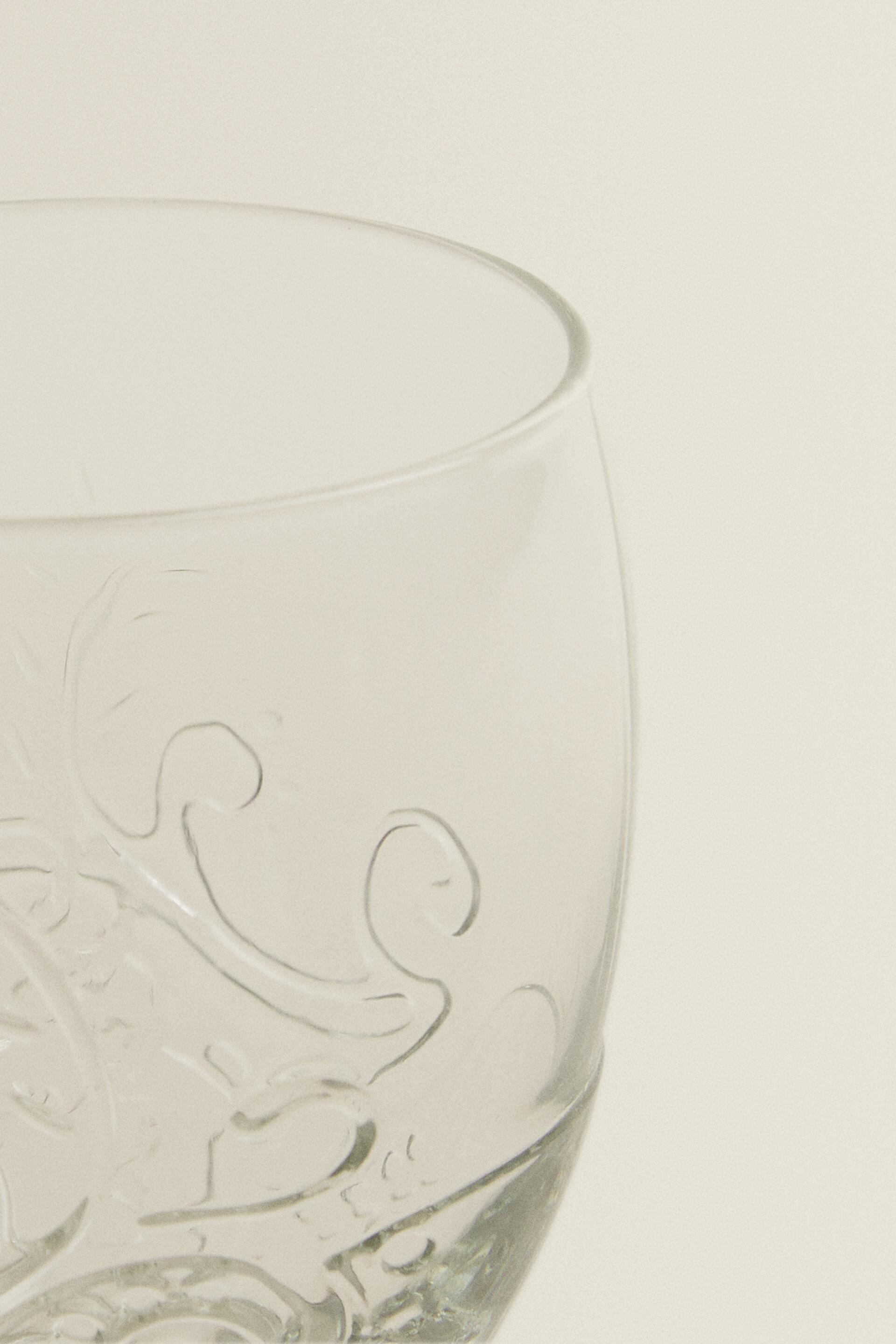 RAISED FLORAL DESIGN GLASS TUMBLER
