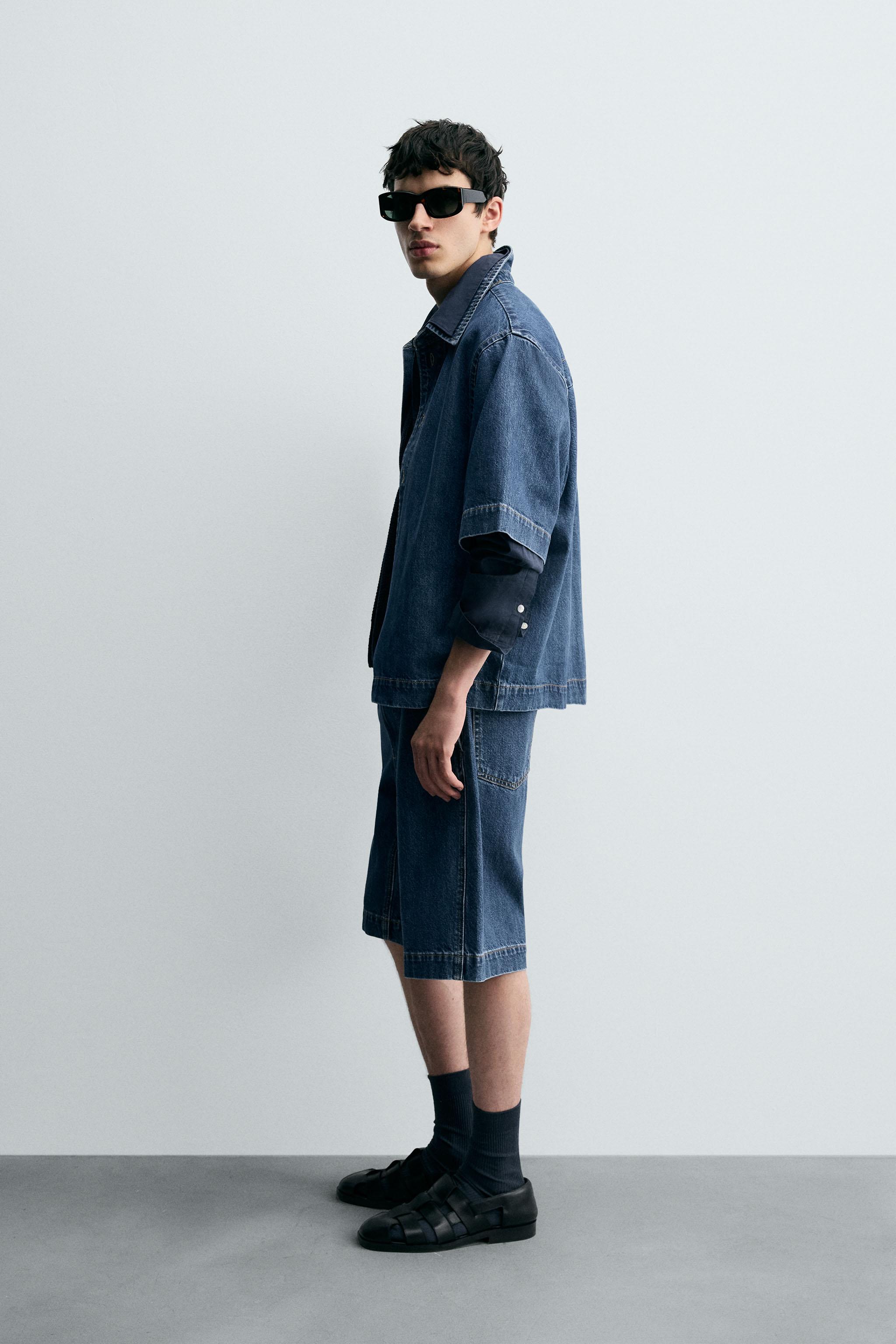 PLEATED RELAXED FIT DENIM SHORTS