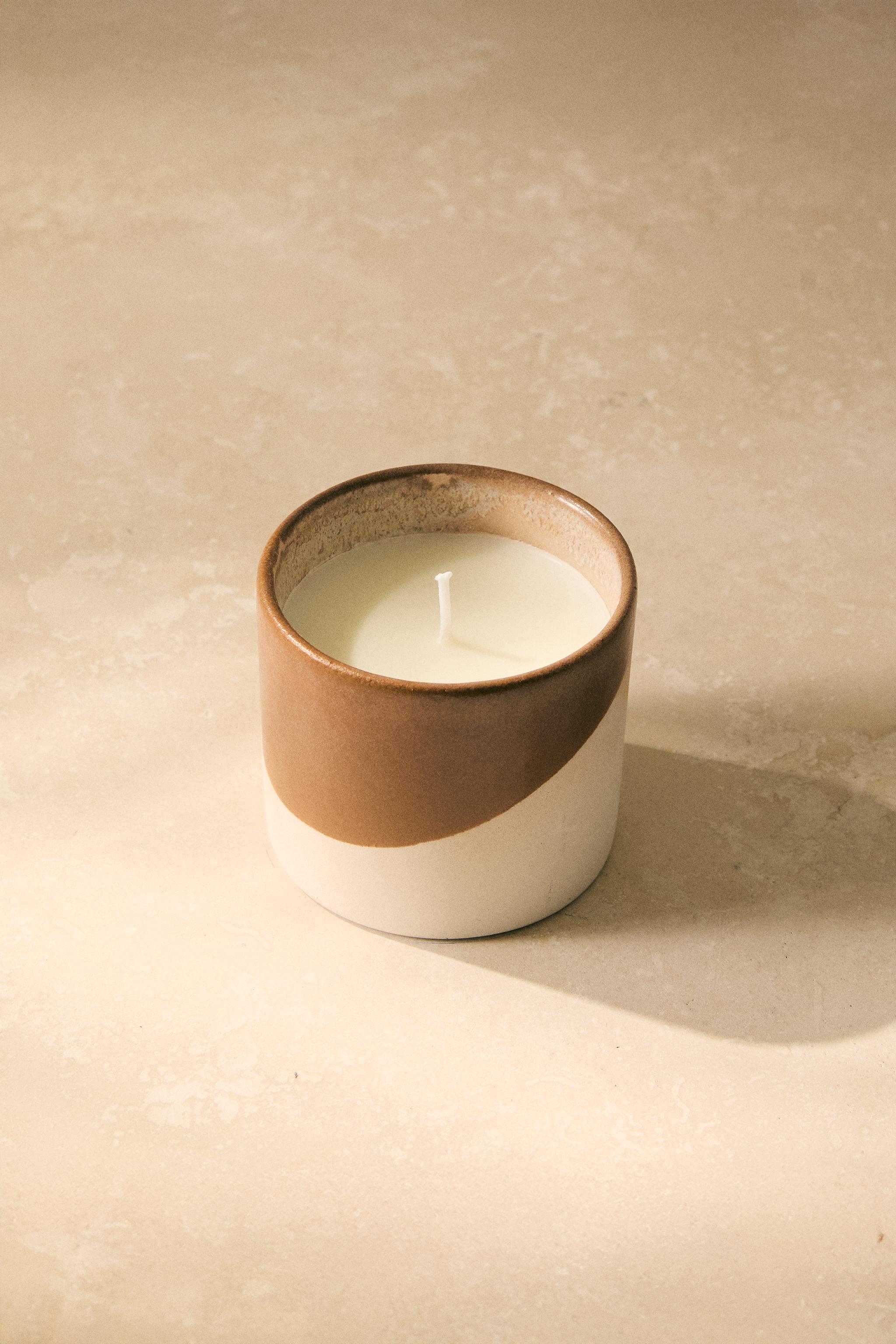 (150 G) SUNSET AT LEGZIRA SCENTED CANDLE