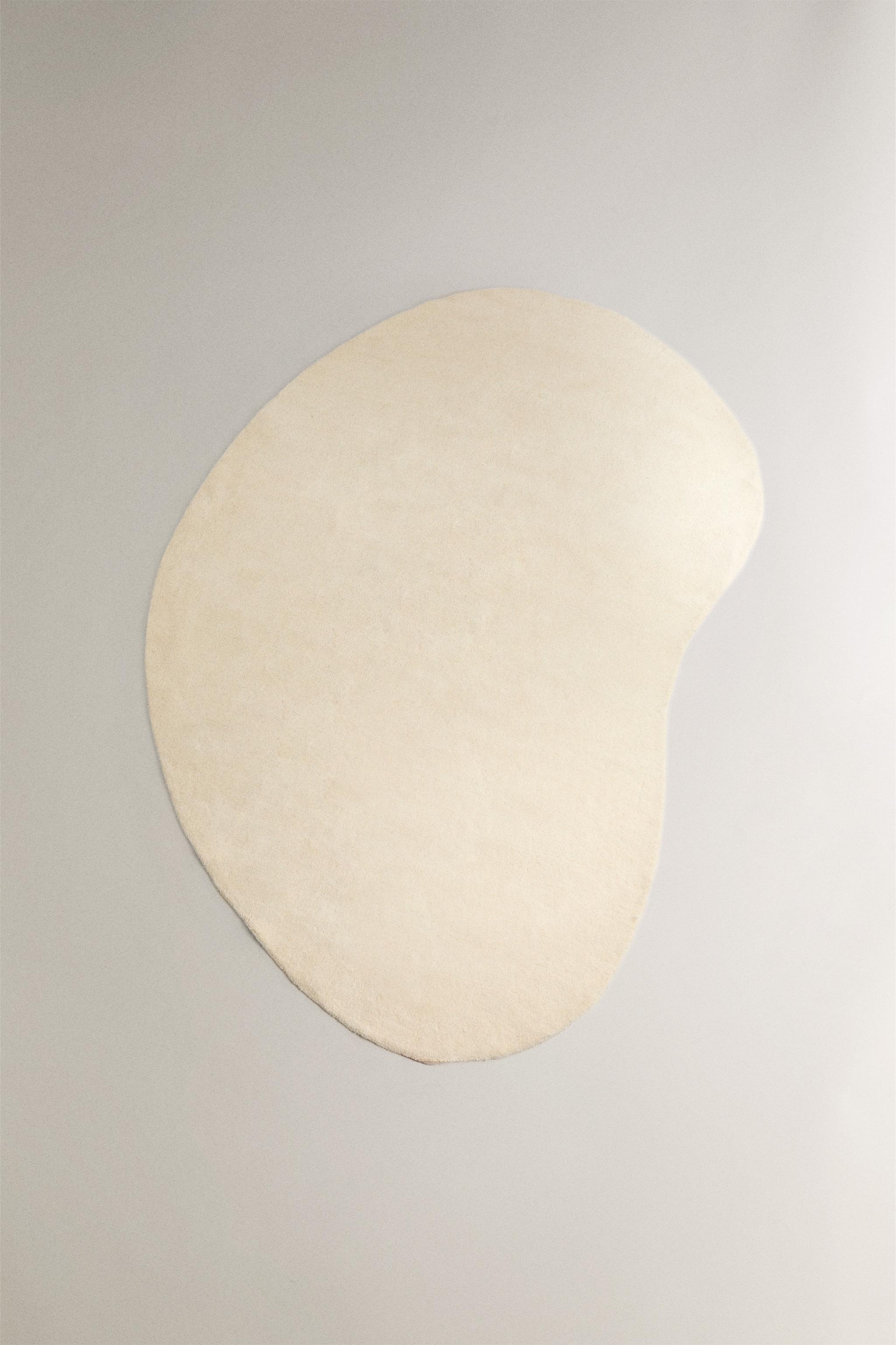 PLAIN IRREGULAR WOOL AREA RUG