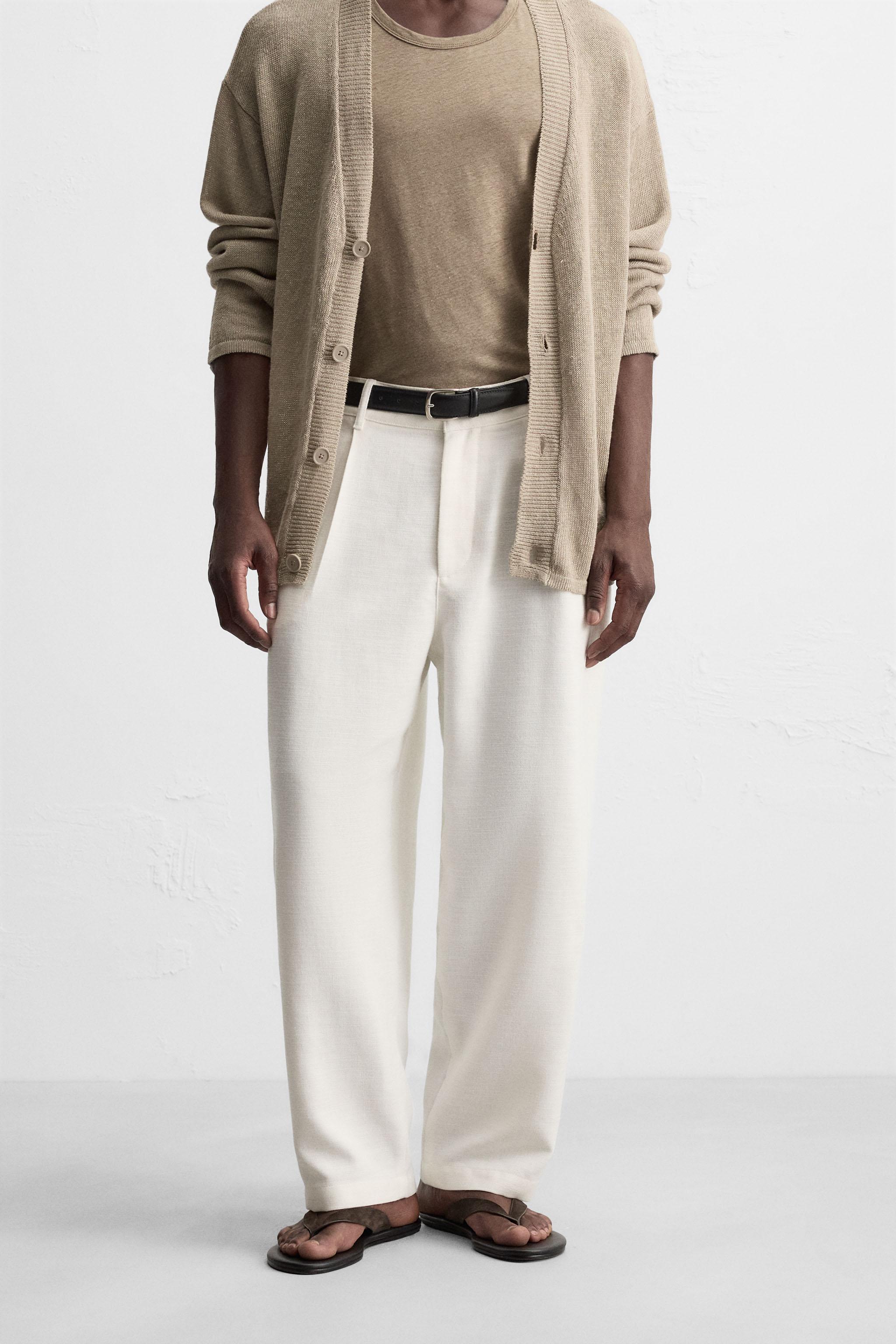 PLEATED RELAXED FIT PANTS