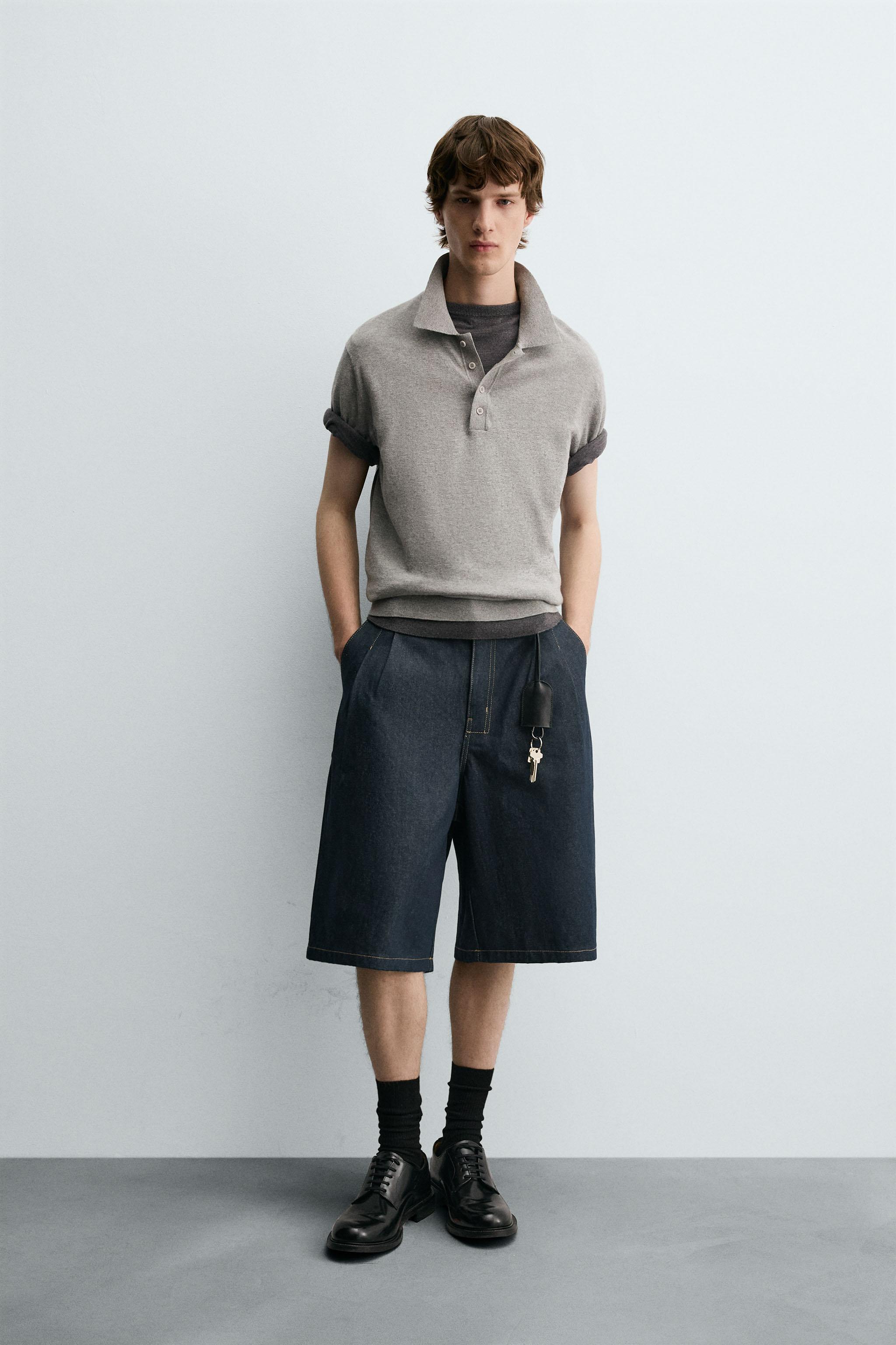 RELAXED FIT PLEATED DENIM SHORTS