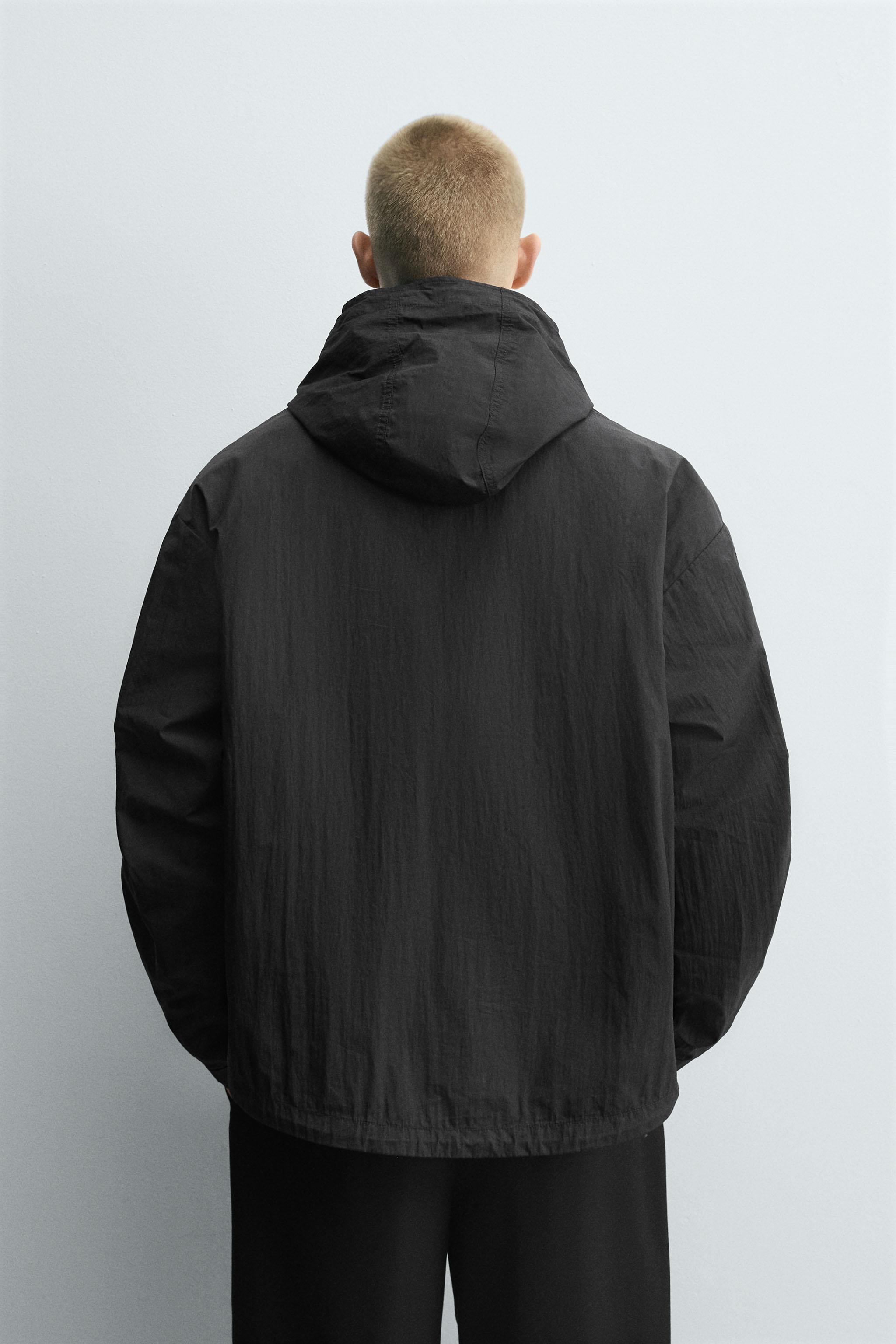 HOODED TECHNICAL JACKET