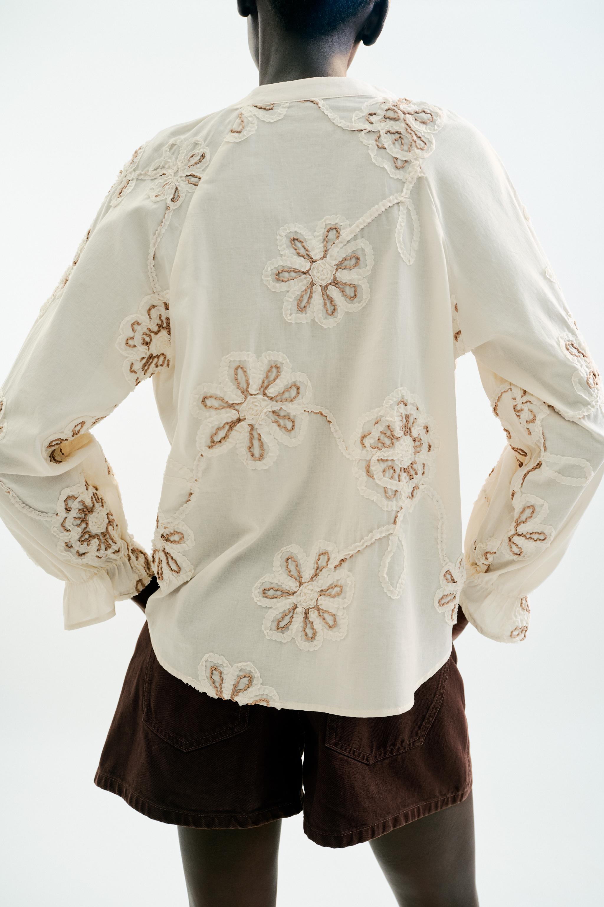 TEXTURED EMBROIDERED BLOUSE