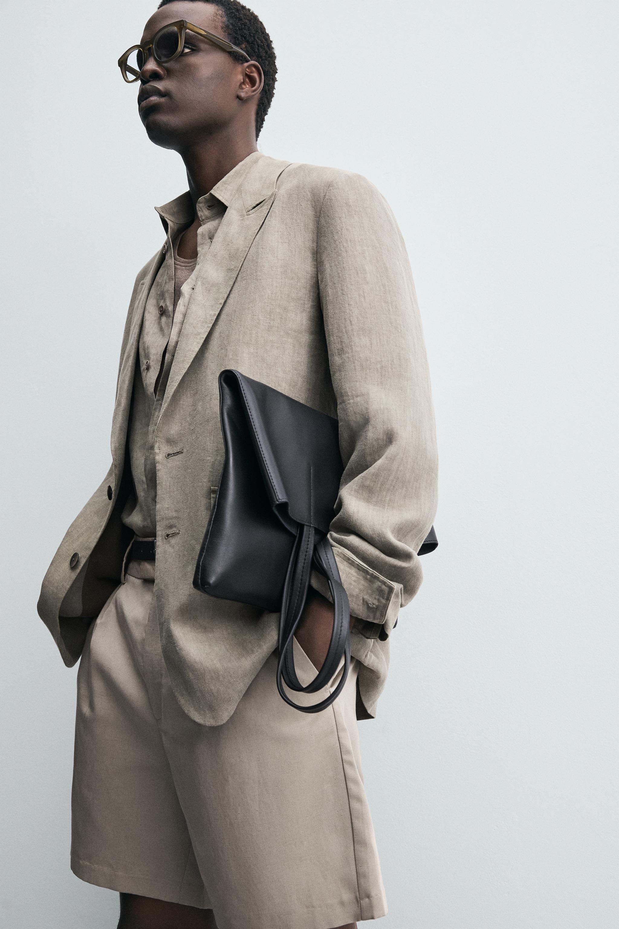 RELAXED FIT PLEATED SHORTS