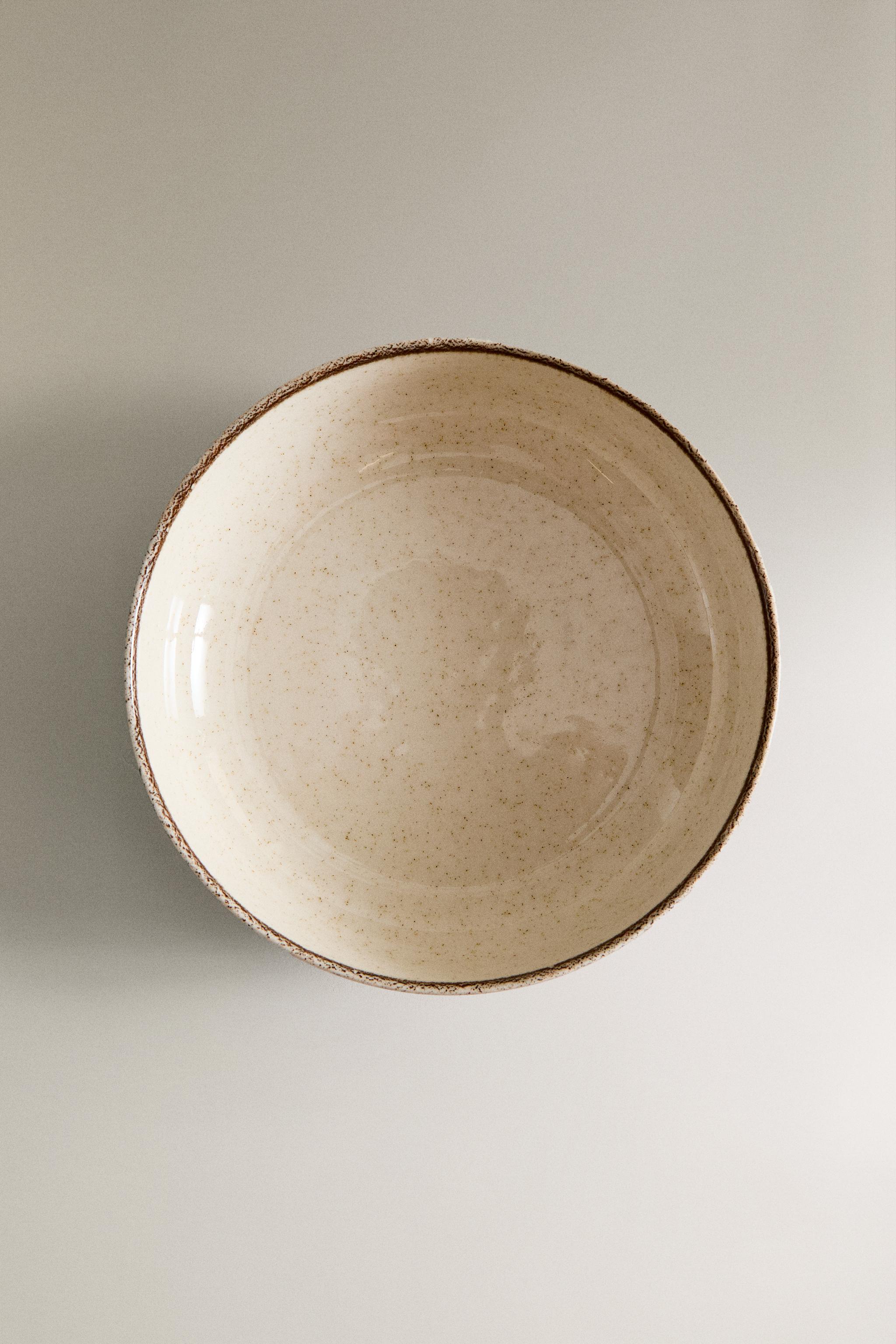 PORCELAIN BOWL WITH ANTIQUE FINISH RIM
